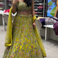 Green beautiful mirror work lehanga with netted dupatta