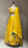 yellow lehenga with peacock design