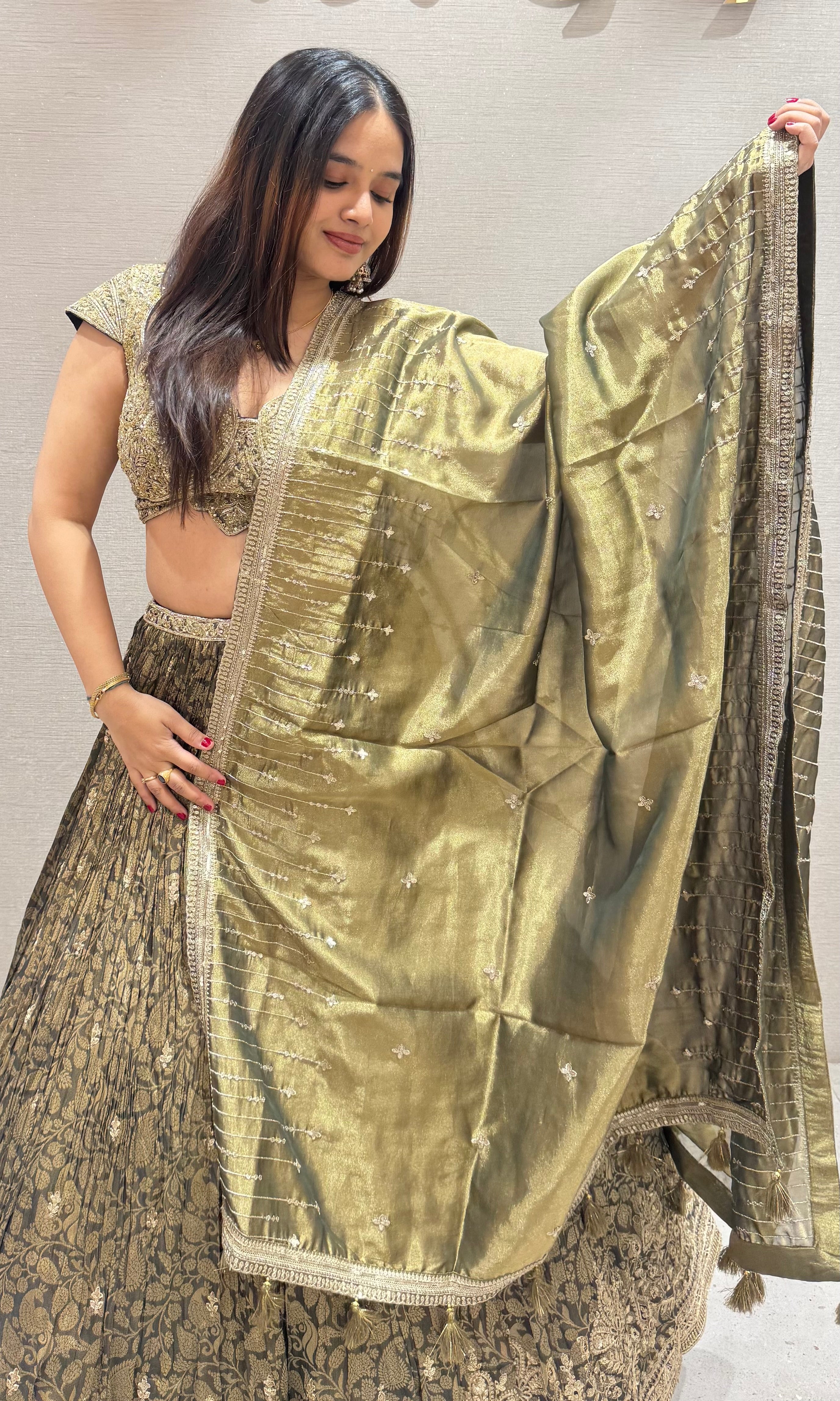 Emerald green crushed lehenga with tissue gold