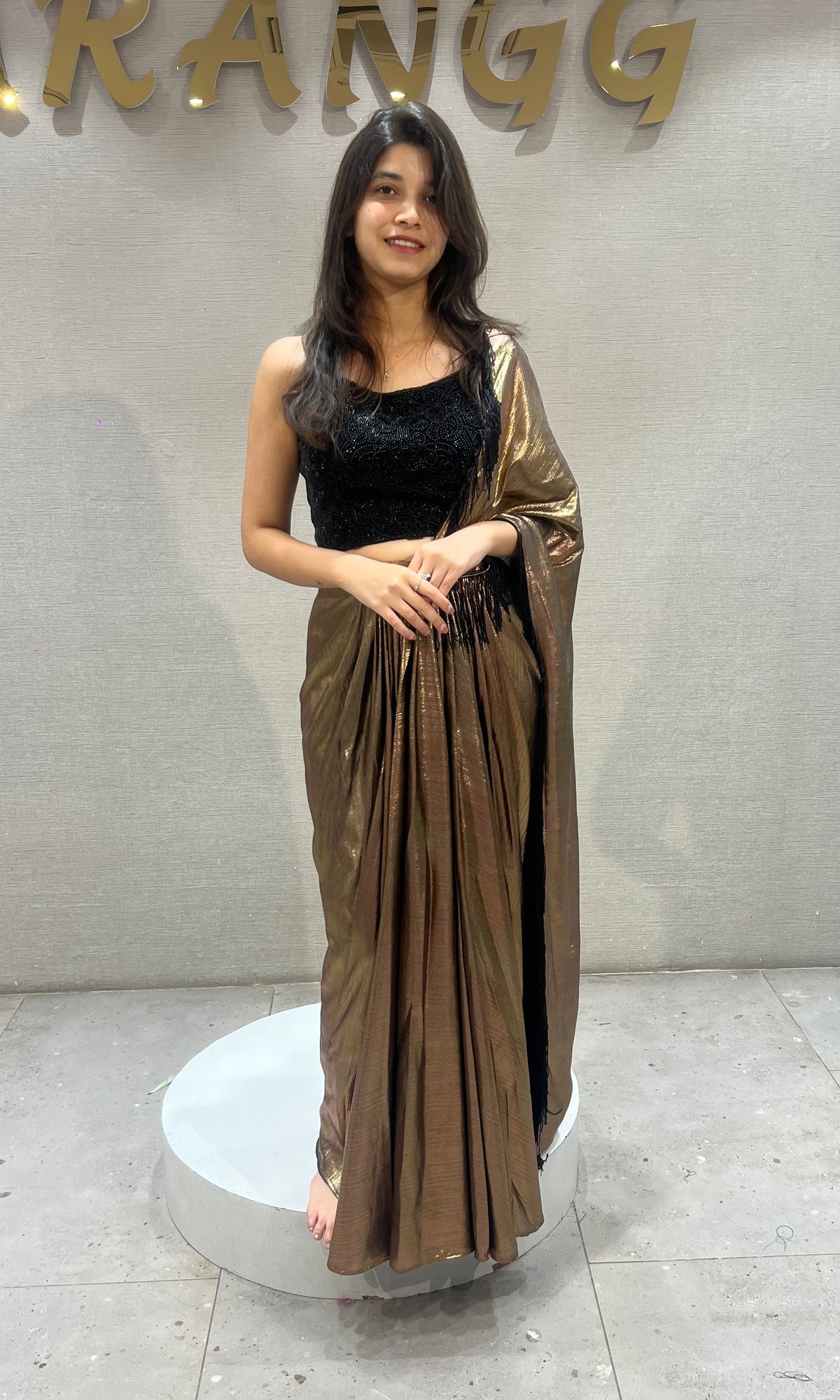 Metallic Brown Pleated Saree with Embroidered Black Blouse