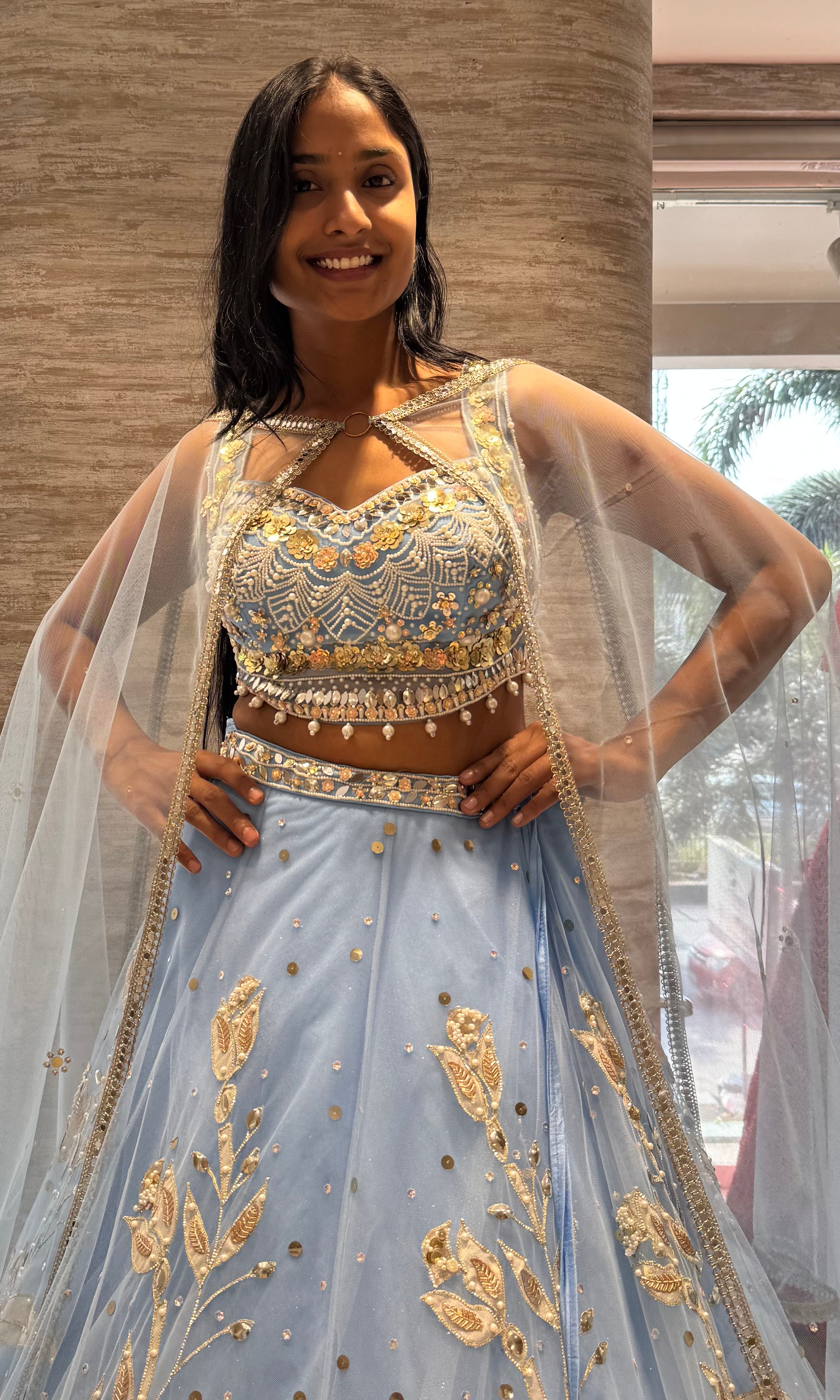 Light blue heavy gold embroidery lehenga