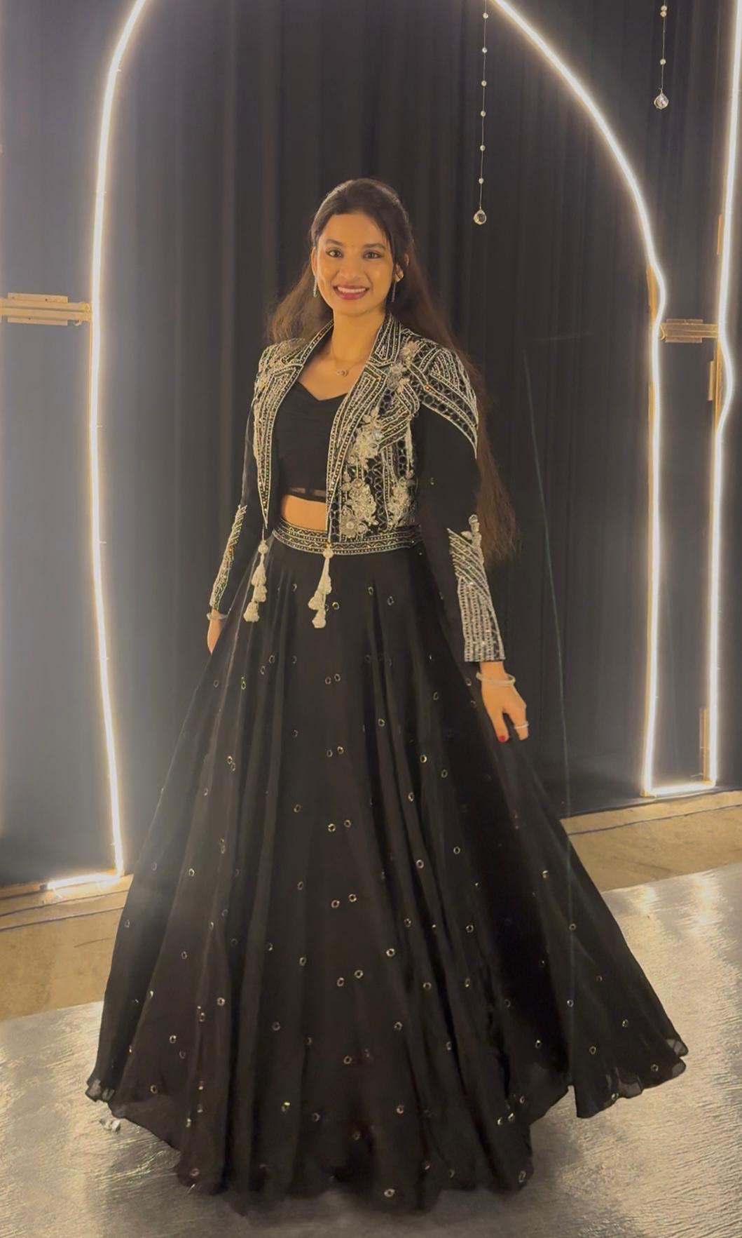 Black lehenga with corset blouse and jacket