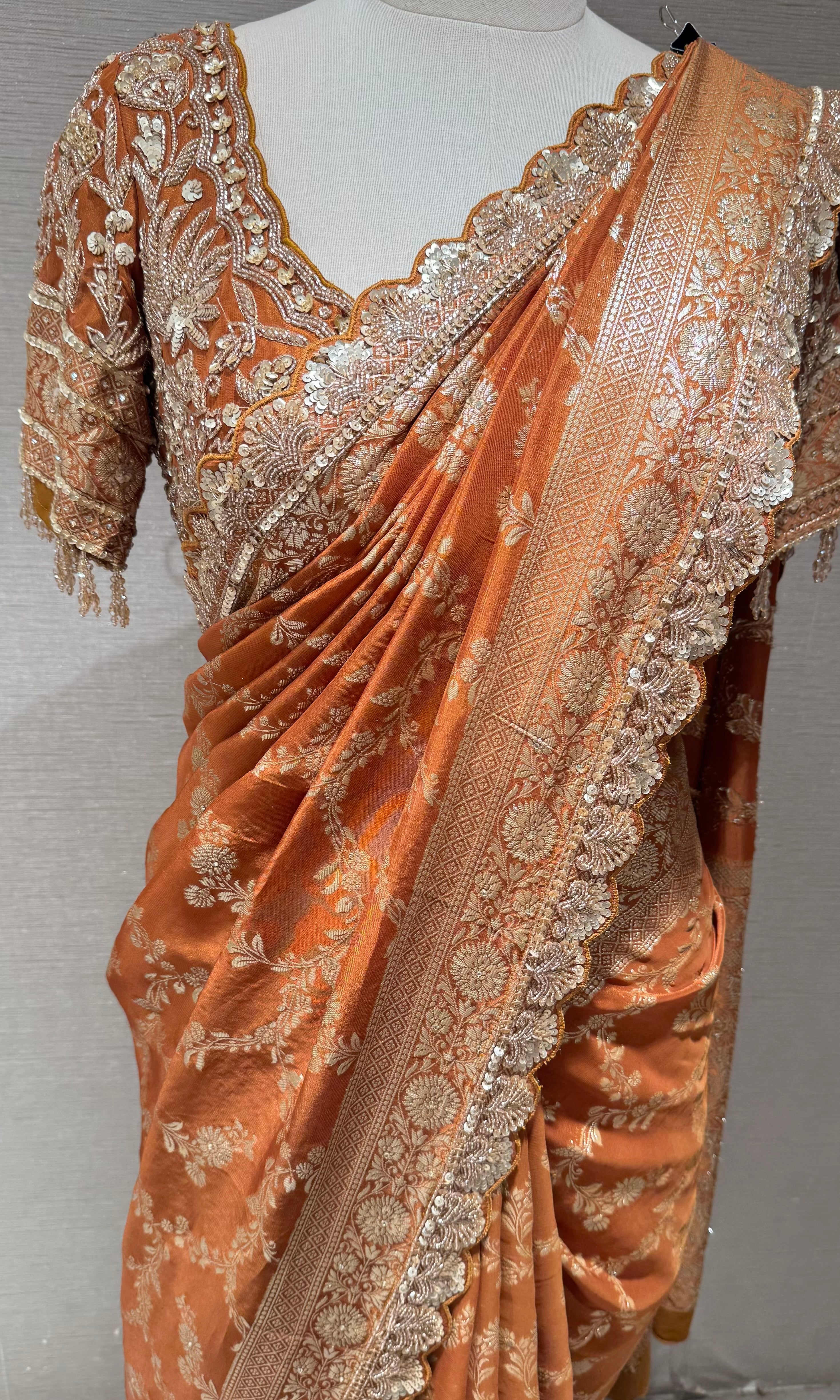Brown designer saree with embroidered blouse