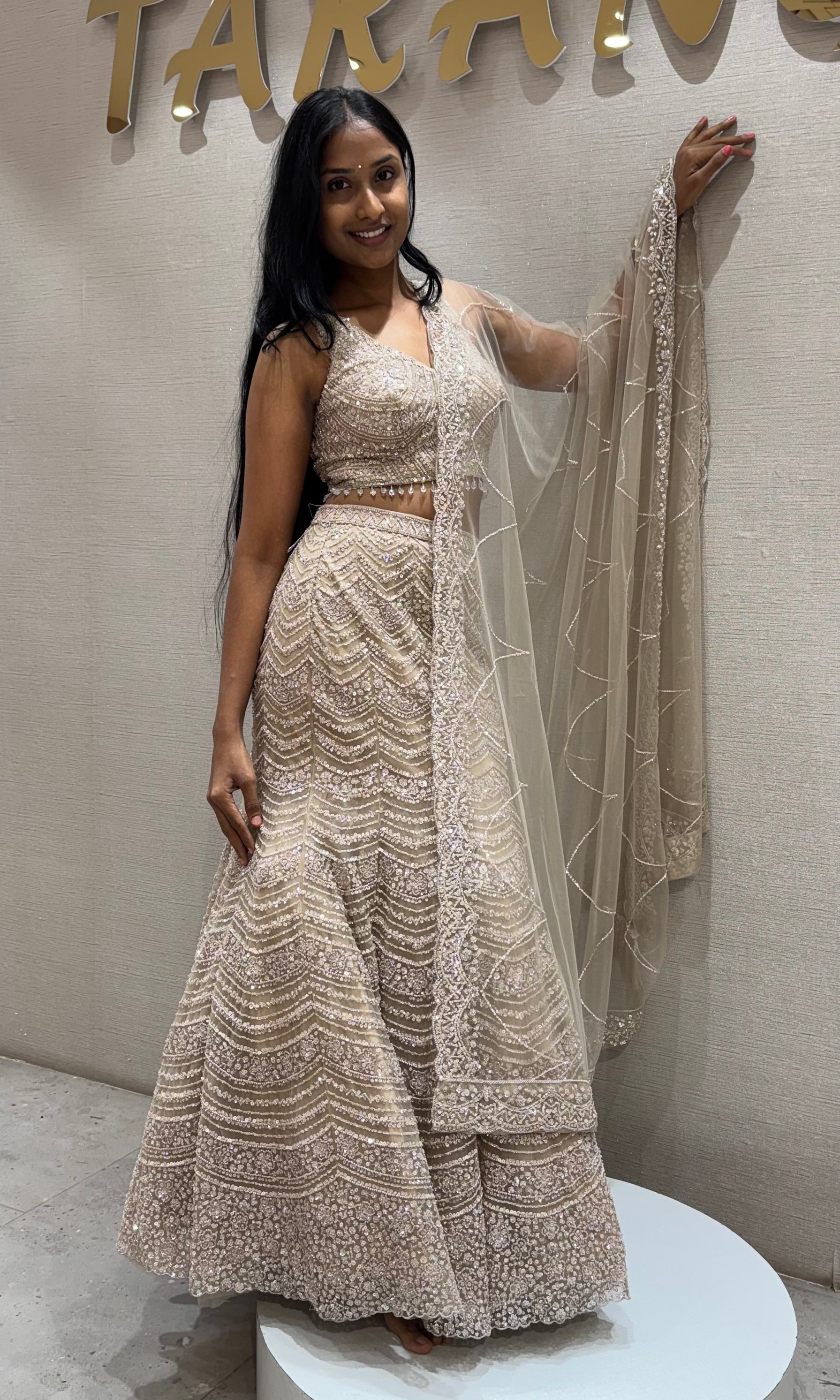 Beige sequins and beads champagne lehenga