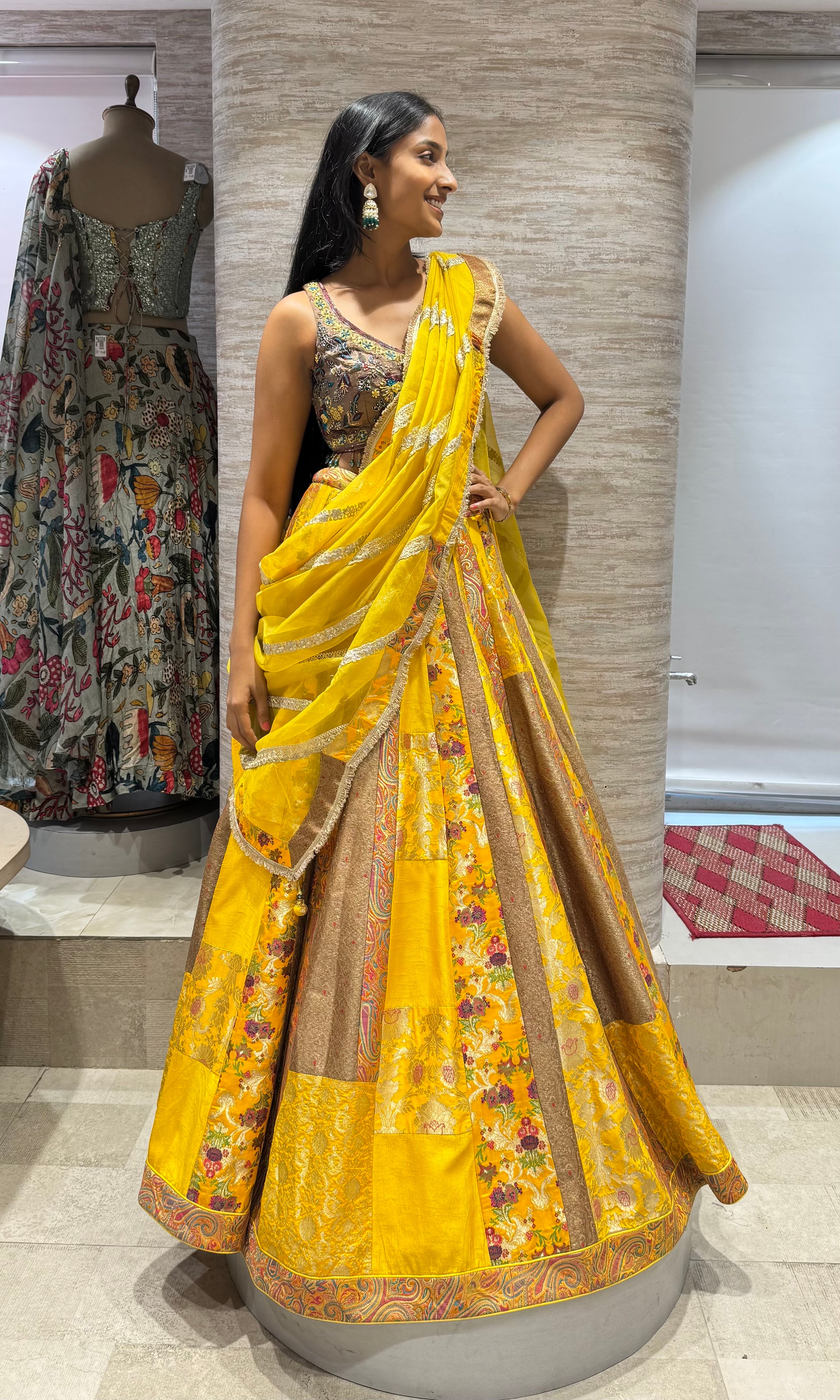 YELOW LEHENGA WITH ELEGANT CORSET BLOUSE