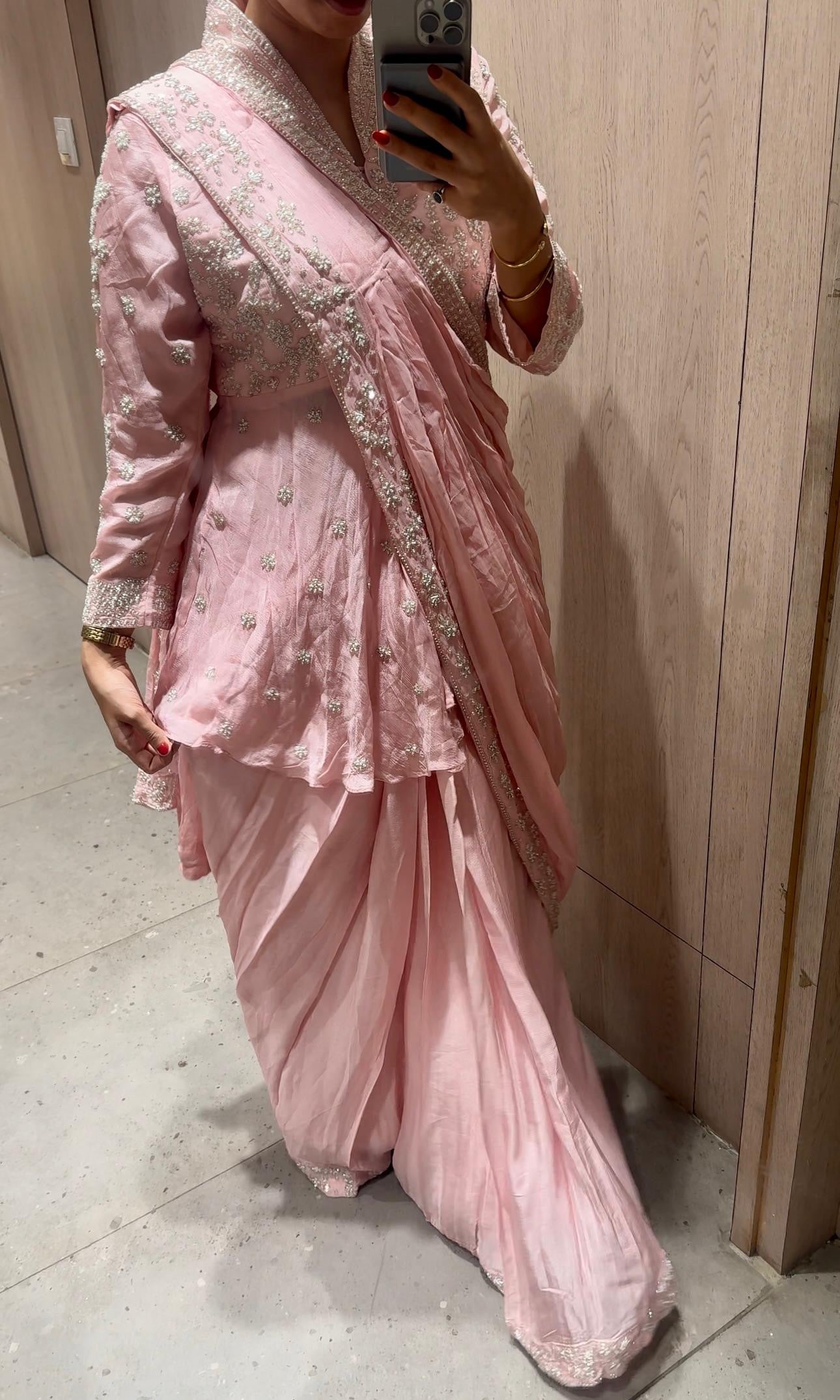 Pink pre drape saree with intricate stone work
