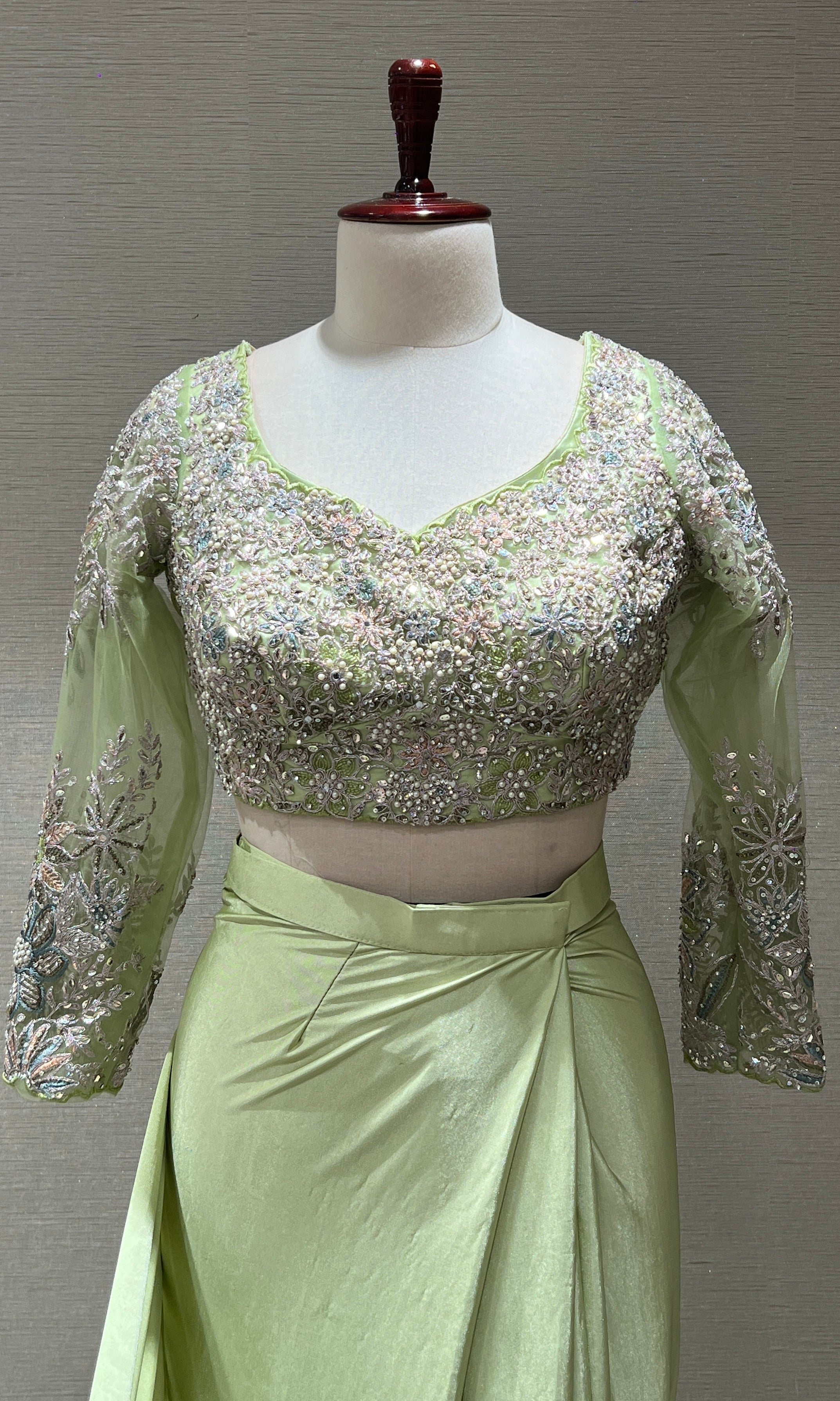 GREEN DRAPE SAREE WITH FLORAL BLOUSE & BELT