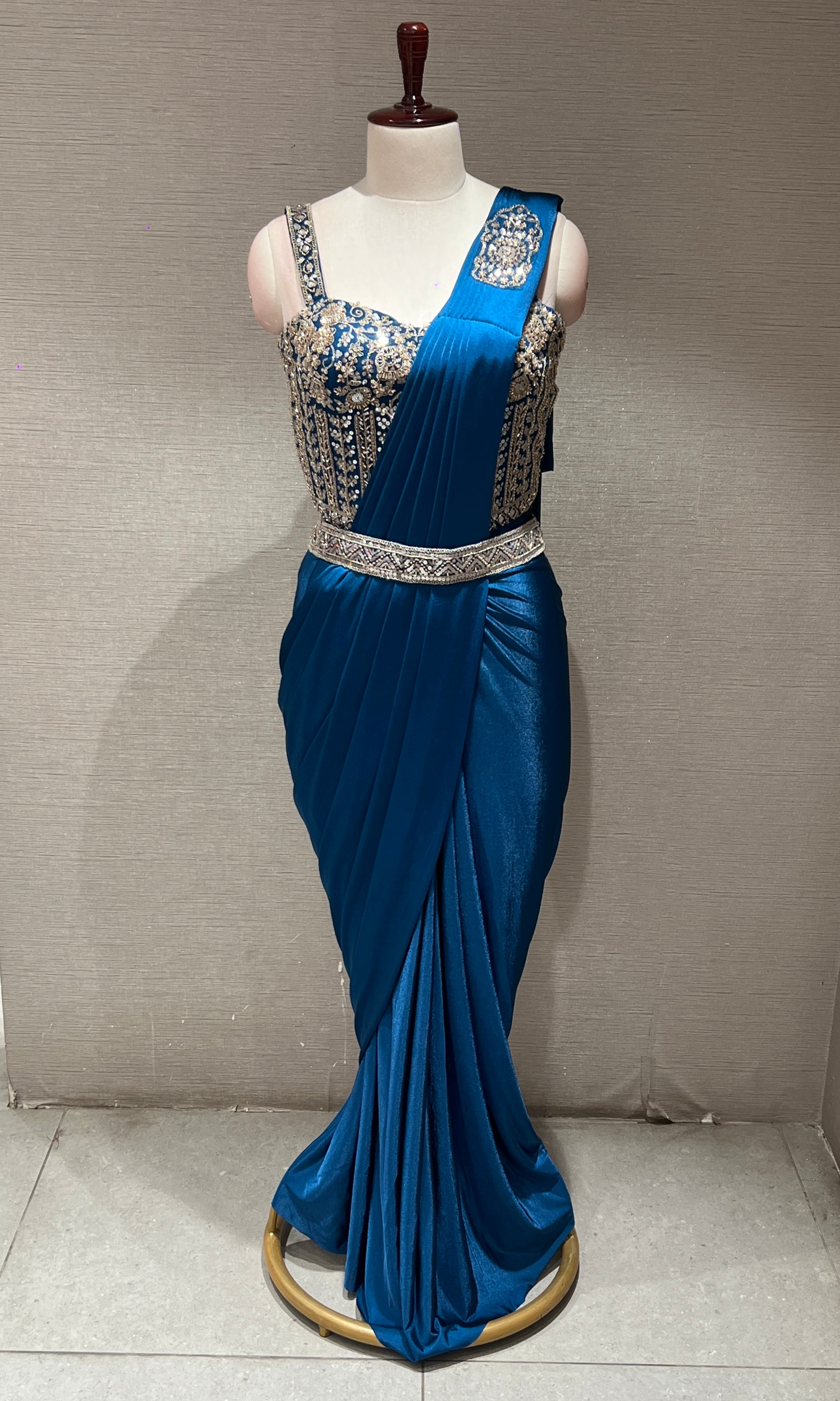blue drape saree with corset blouse and belt