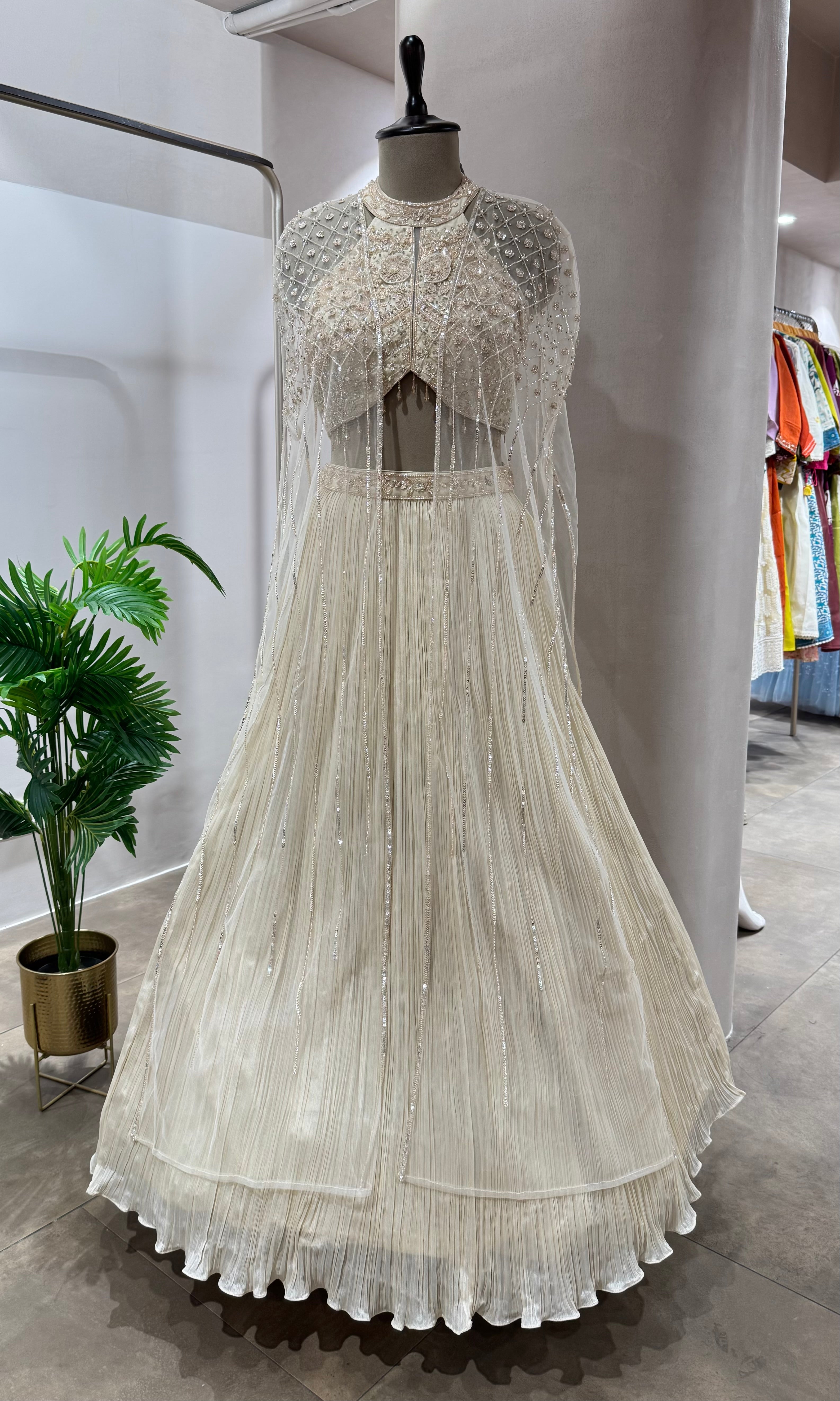 CREAM HALTER NECK CRYSTAL WORK BLOUSE WITH CAPE