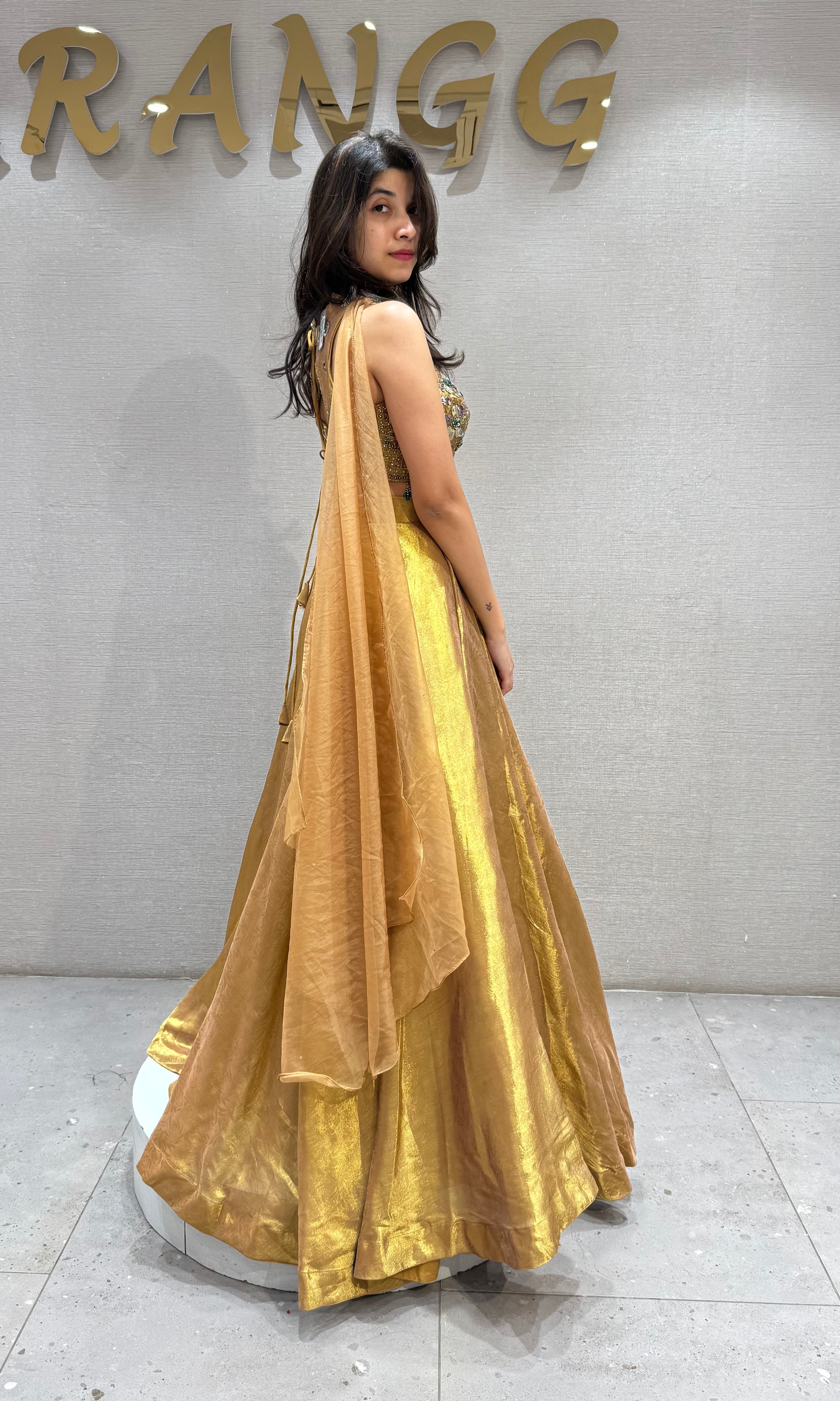 Gold tissue intricate embroidered lehenga