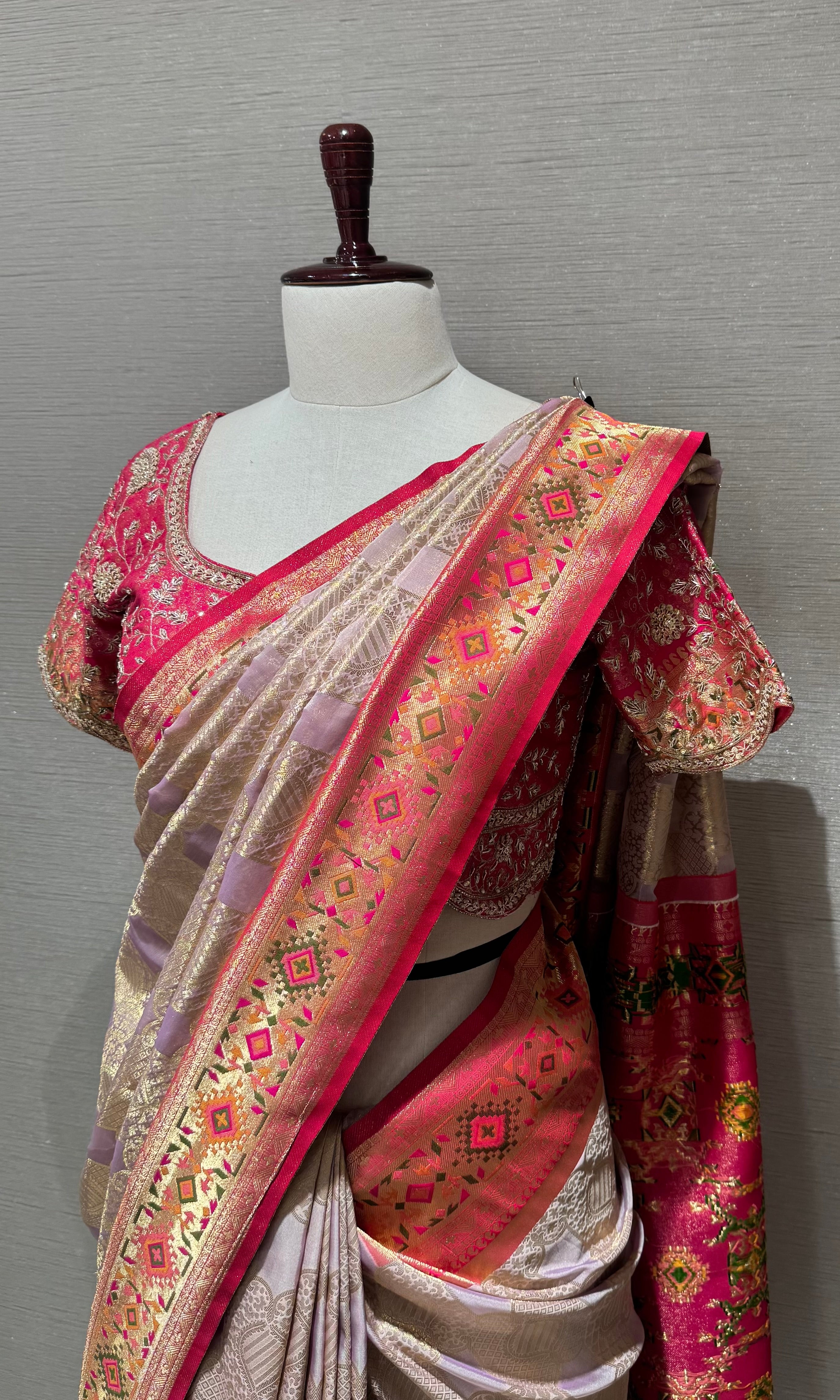 pink Kanchipuram silk saree with embroidered blouse