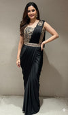 black drape saree with corset blouse and belt