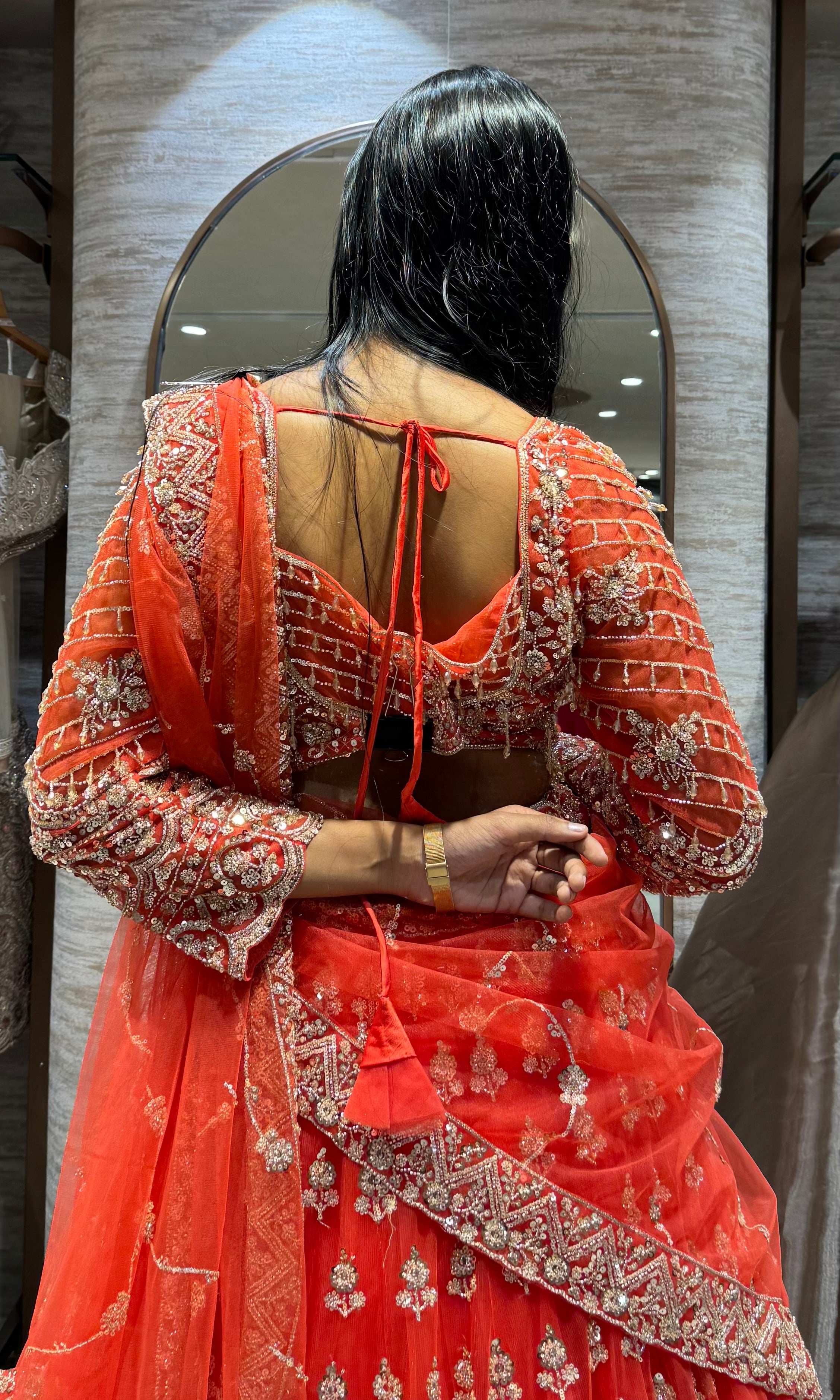 orange bridal intricate embroidery lehenga