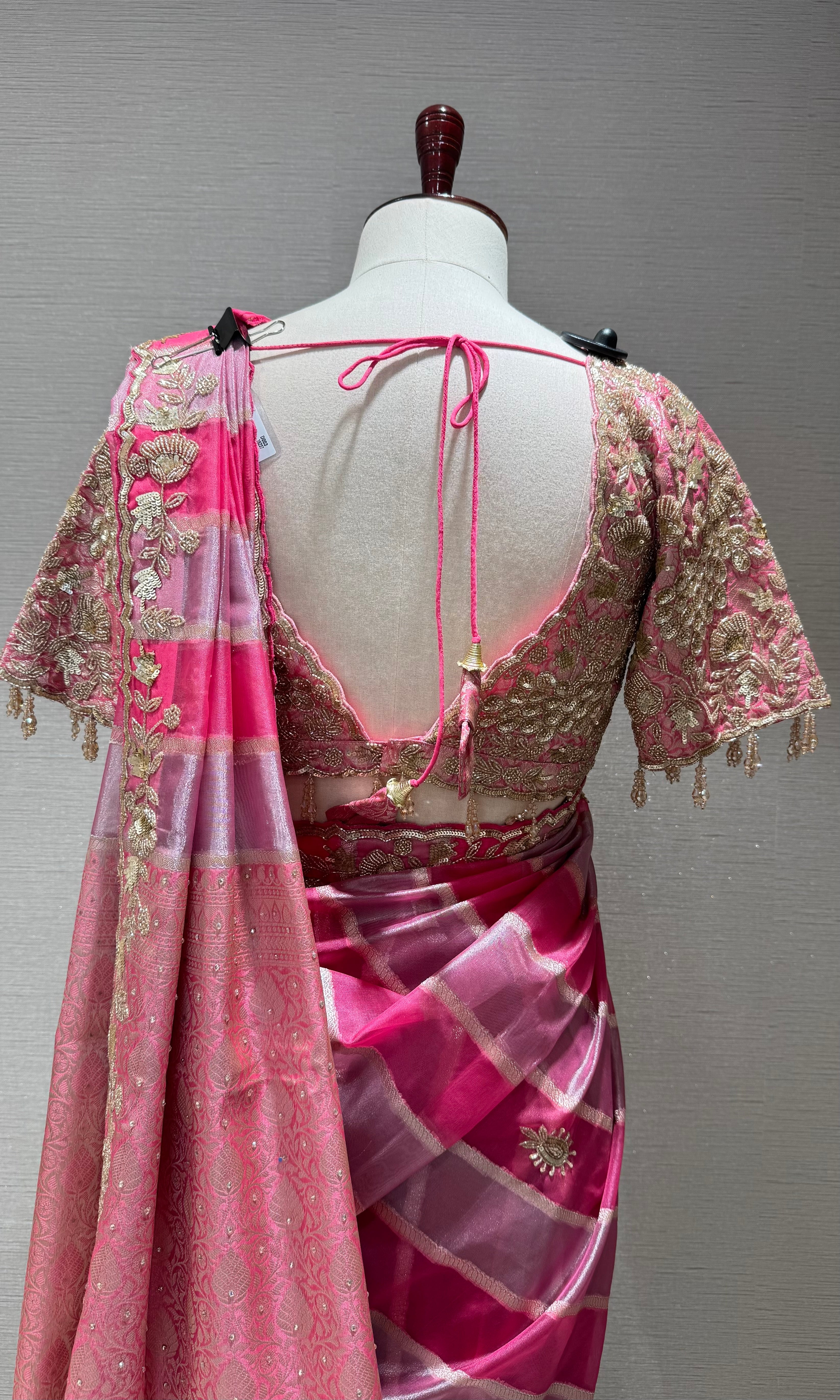 pink leheriya tissue saree with embellished blouse