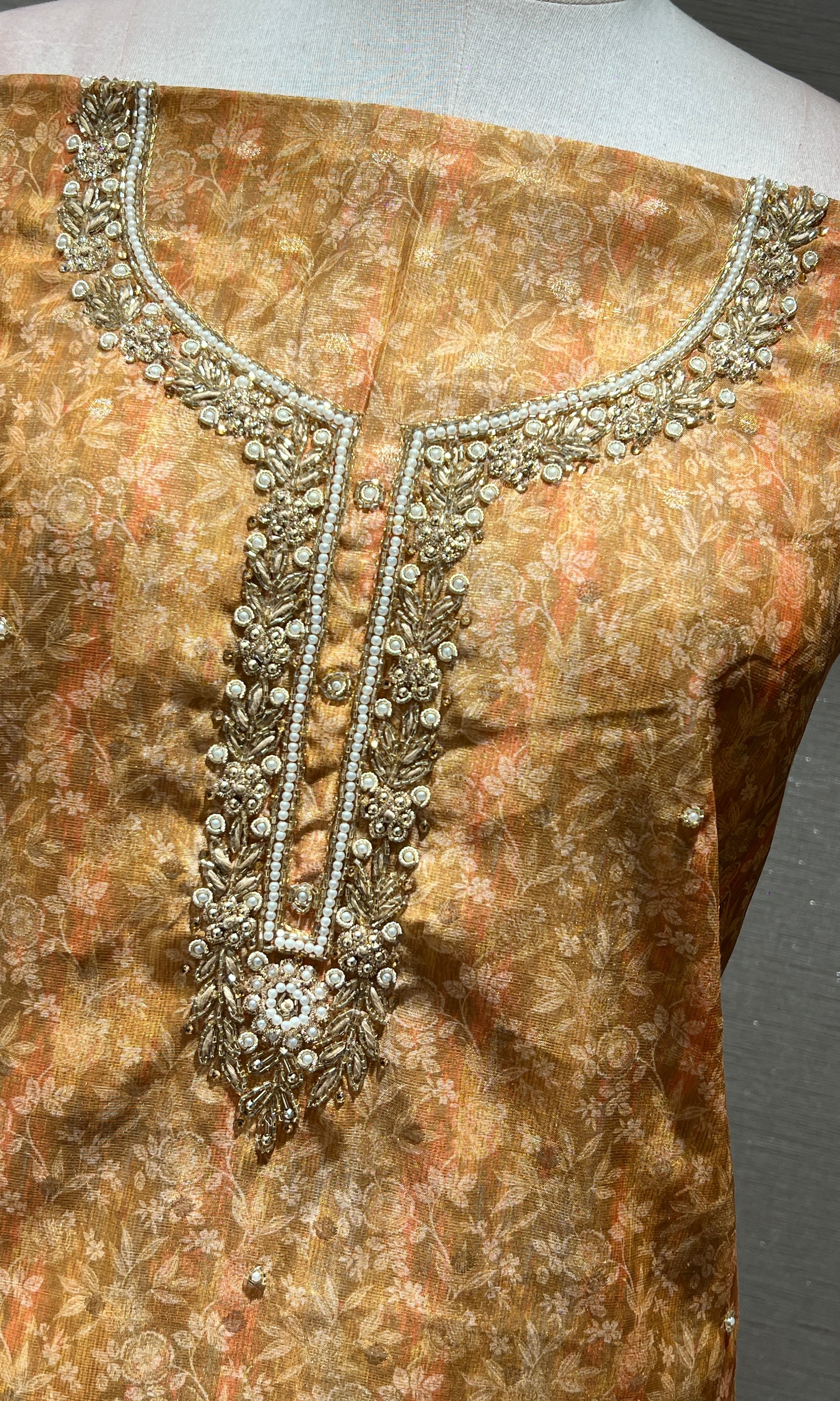 Yellow and golden dress material