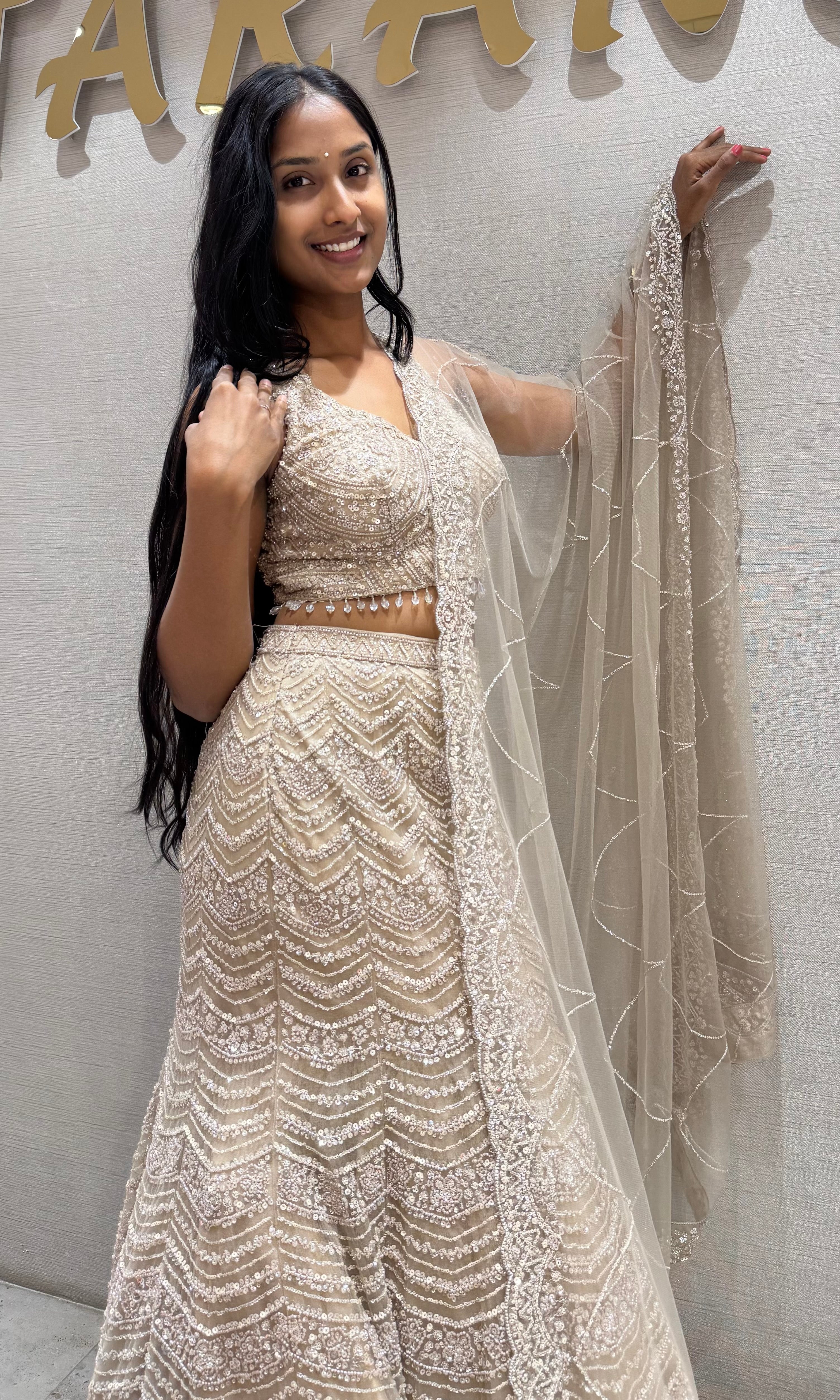Beige sequins and beads champagne lehenga