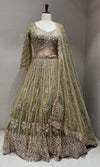 Green intricate embroidered lehenga set