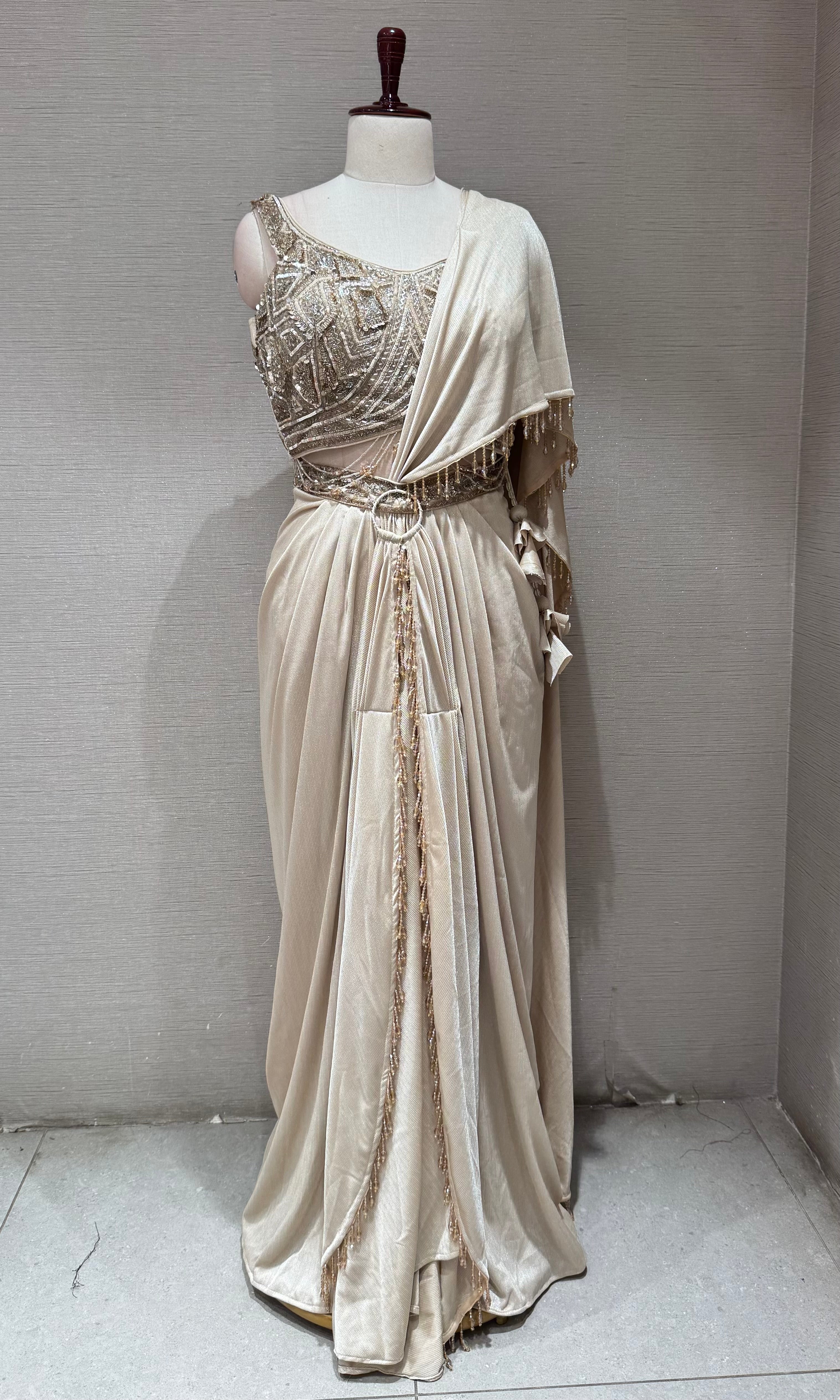 Beige & Gold Draped saree with Embellished Corset