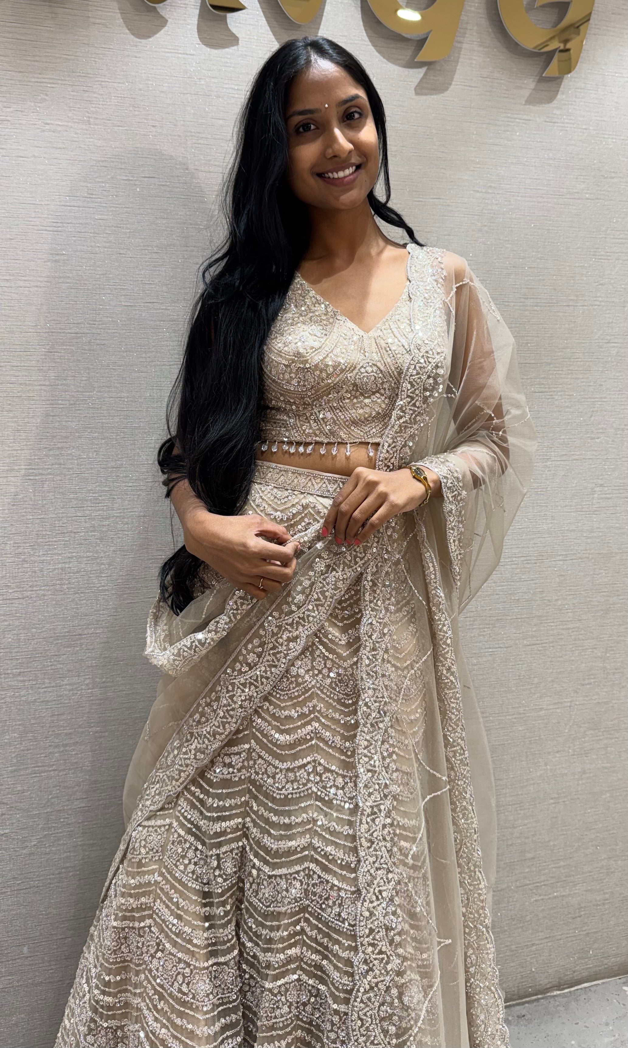 Beige sequins and beads champagne lehenga