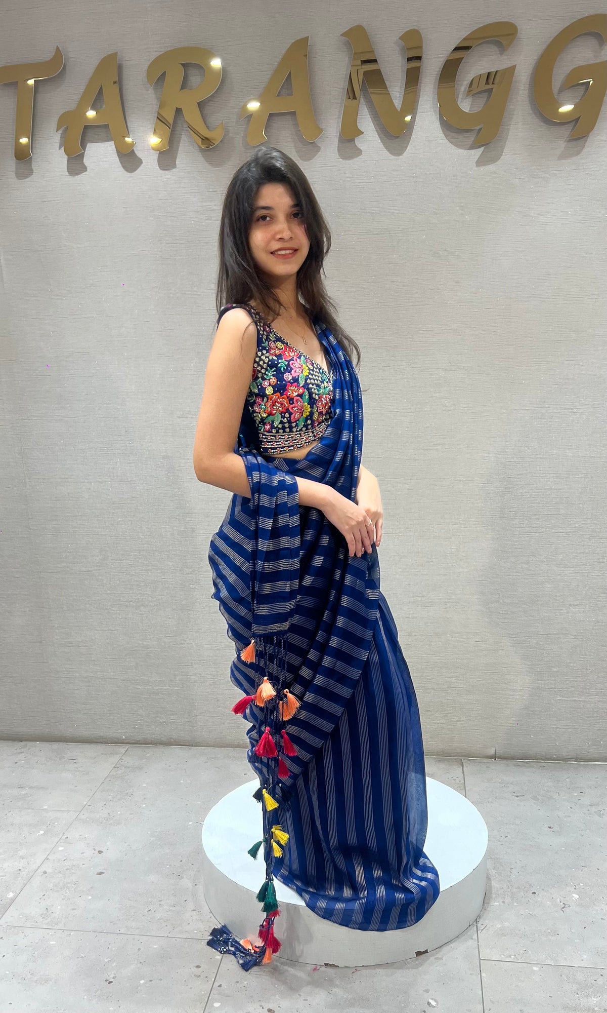 blue and silver striped Drape saree with intricate blouse