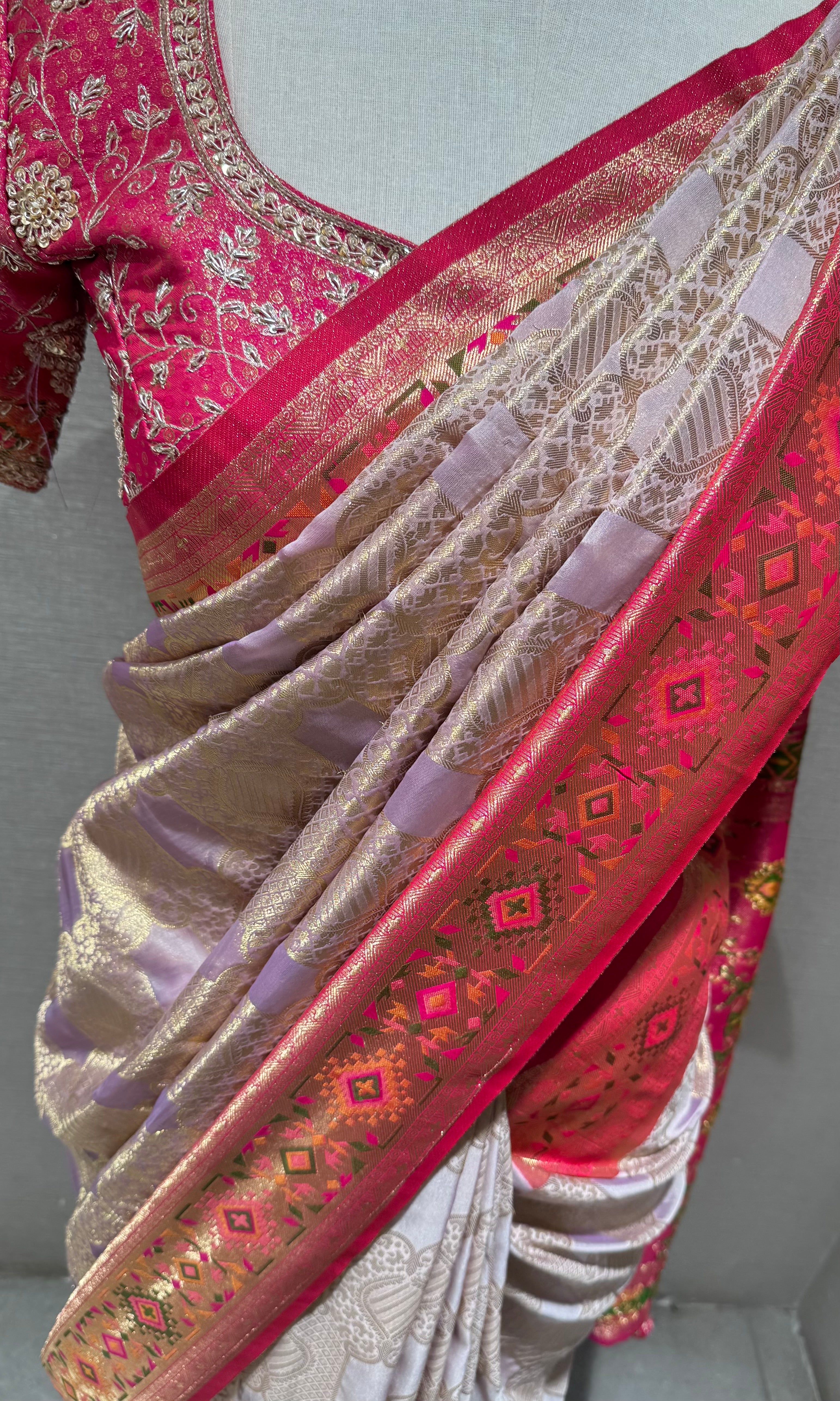 pink Kanchipuram silk saree with embroidered blouse
