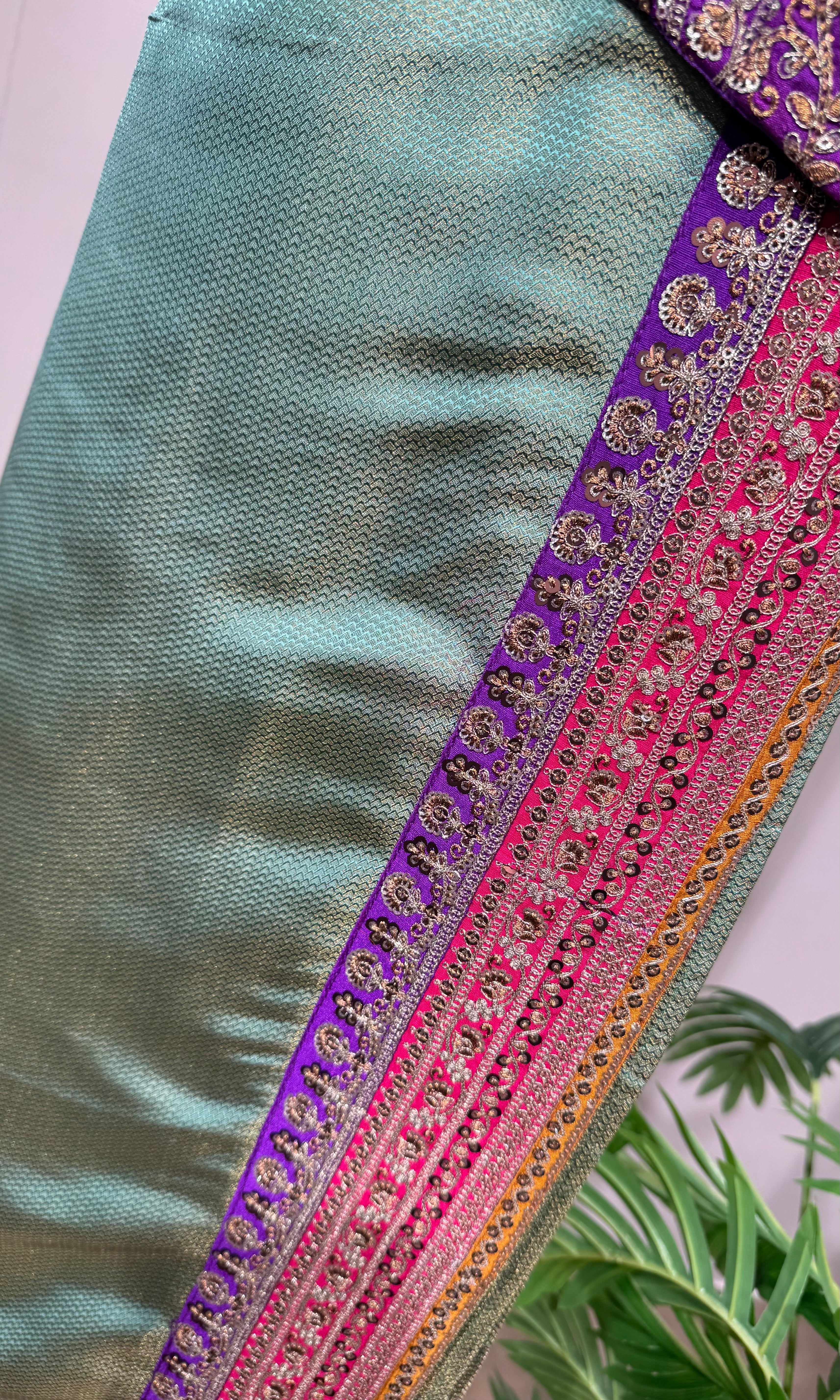 Green saree with embroidered blouse
