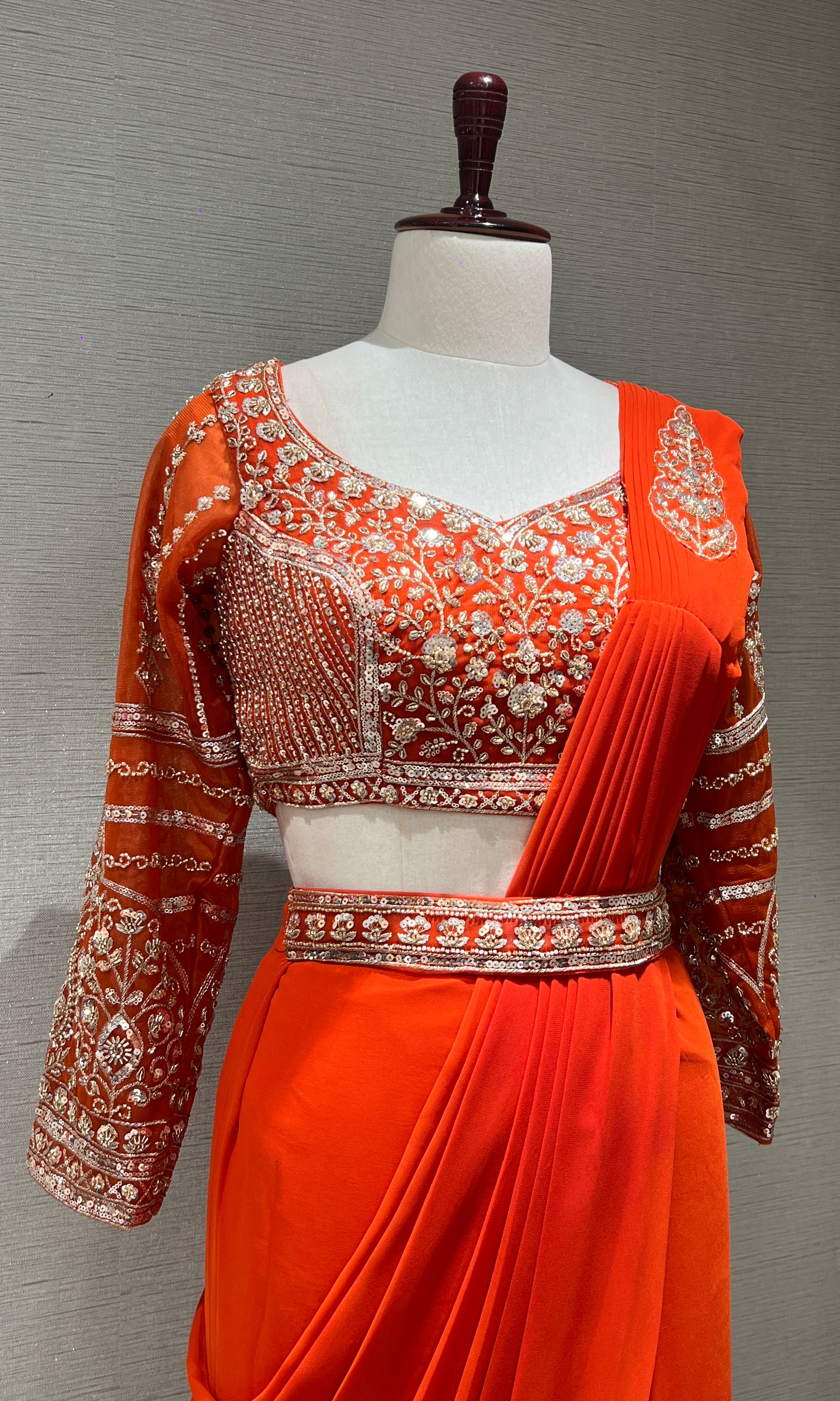 ORANGE drape saree with embellished blouse
