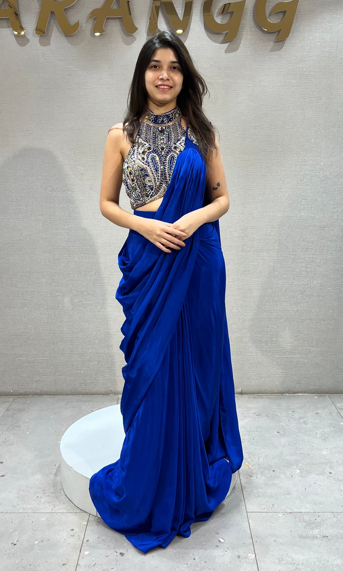 Royal blue draped saree with Crystals & Beadwork Halter blouse