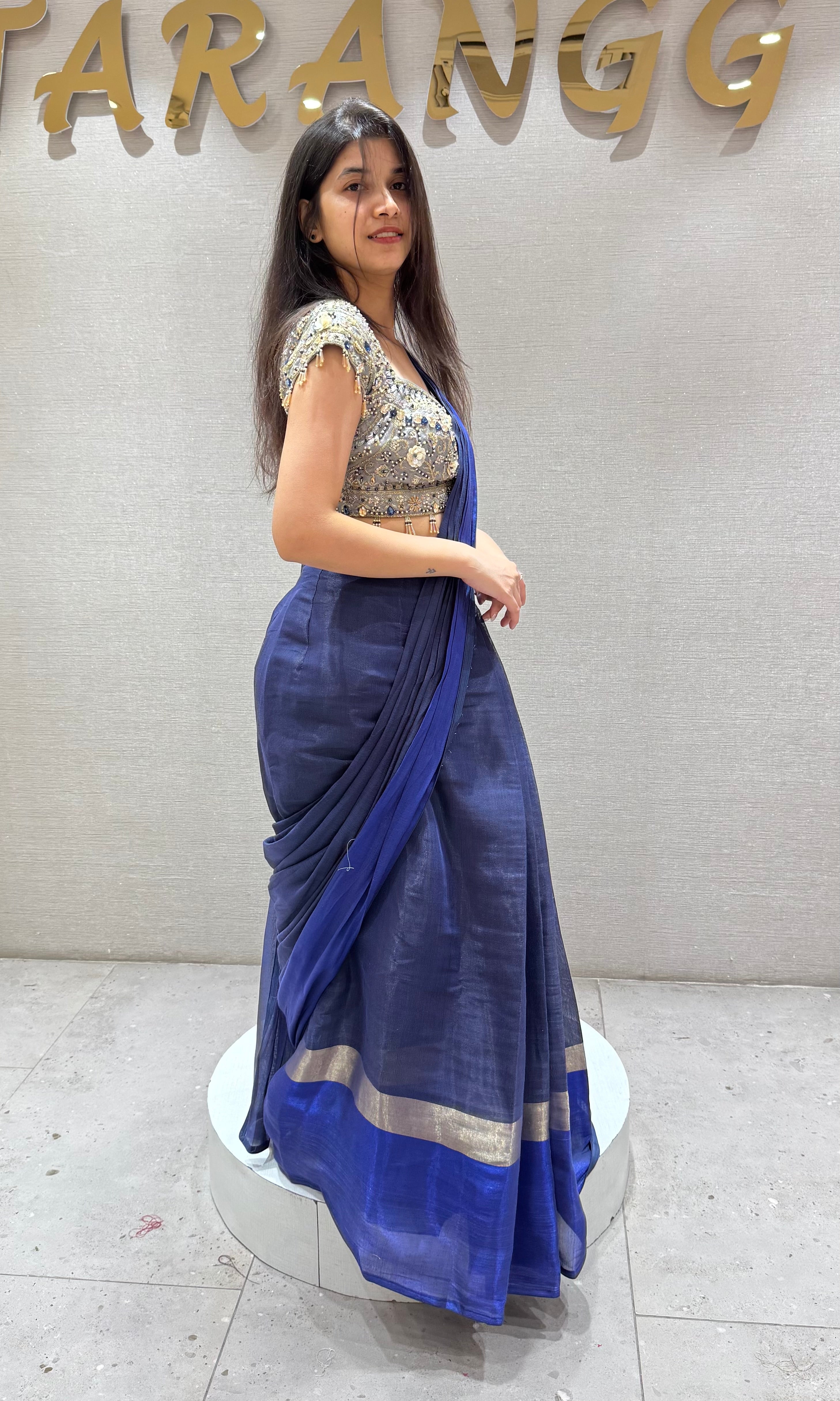 Blue Drape Saree with floral blouse