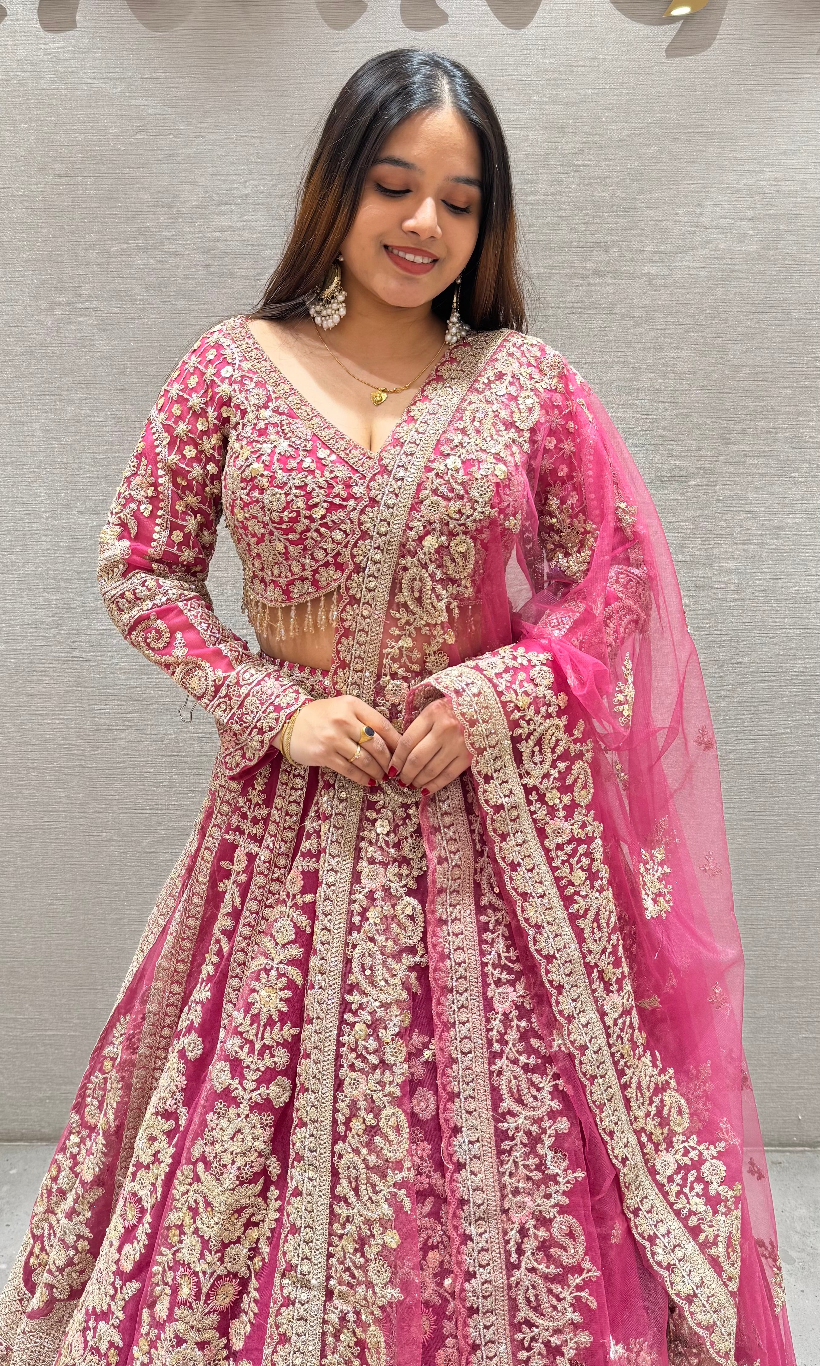 Pink lehenga with golden embroidery