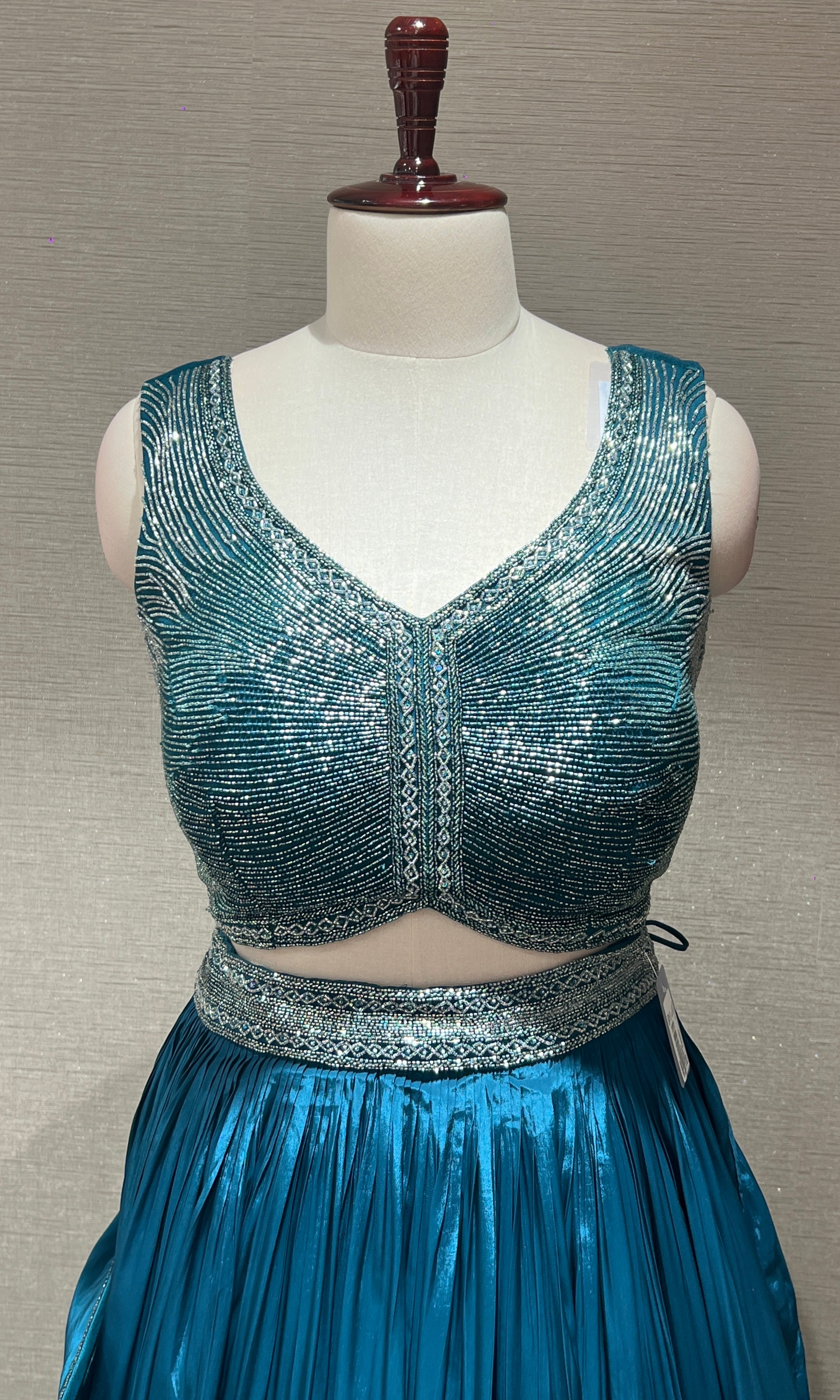 Peacock green Lehenga with draped sequins Pallu