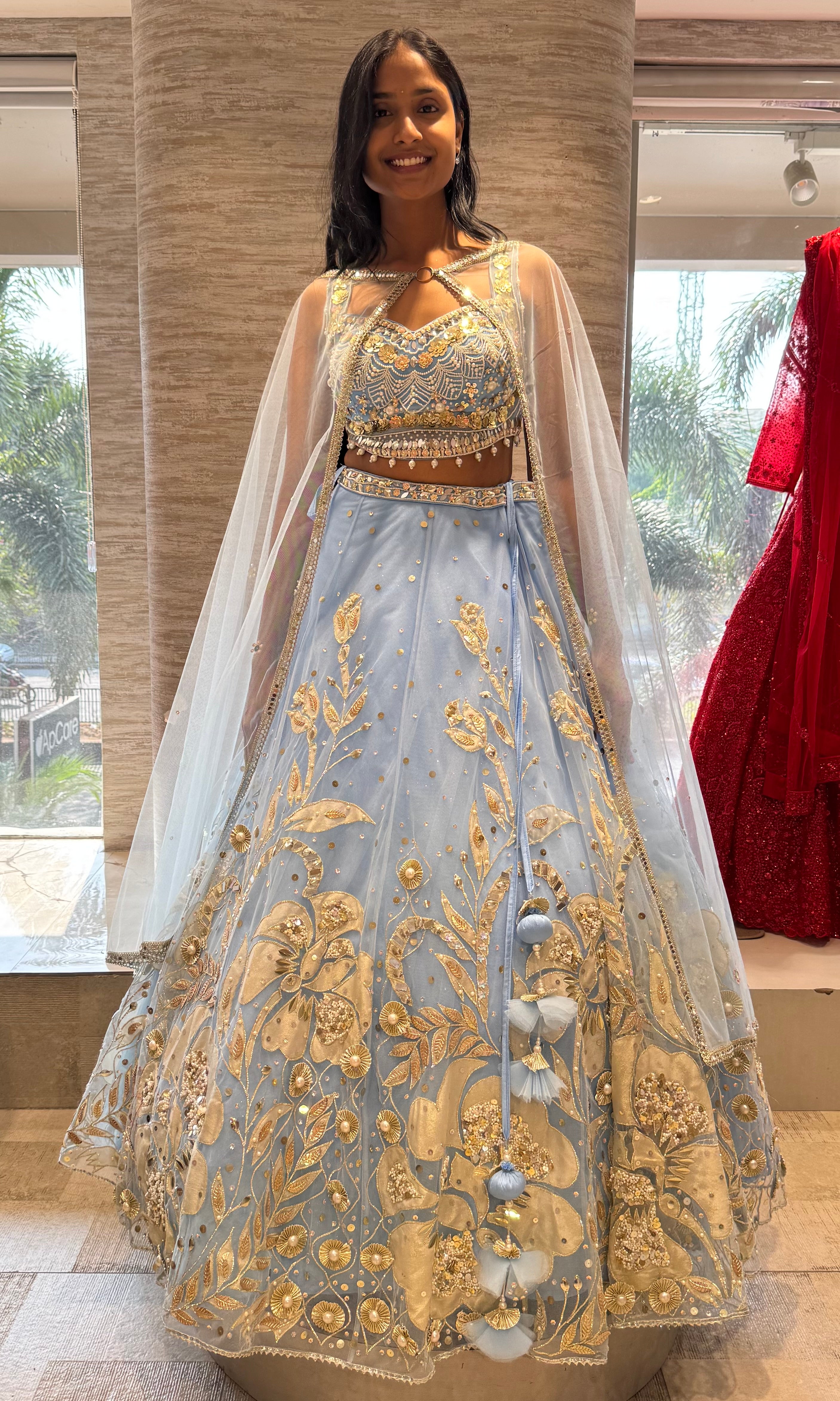 Light blue heavy gold embroidery lehenga
