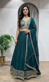 Green Silk Lehenga set with Gold Border
