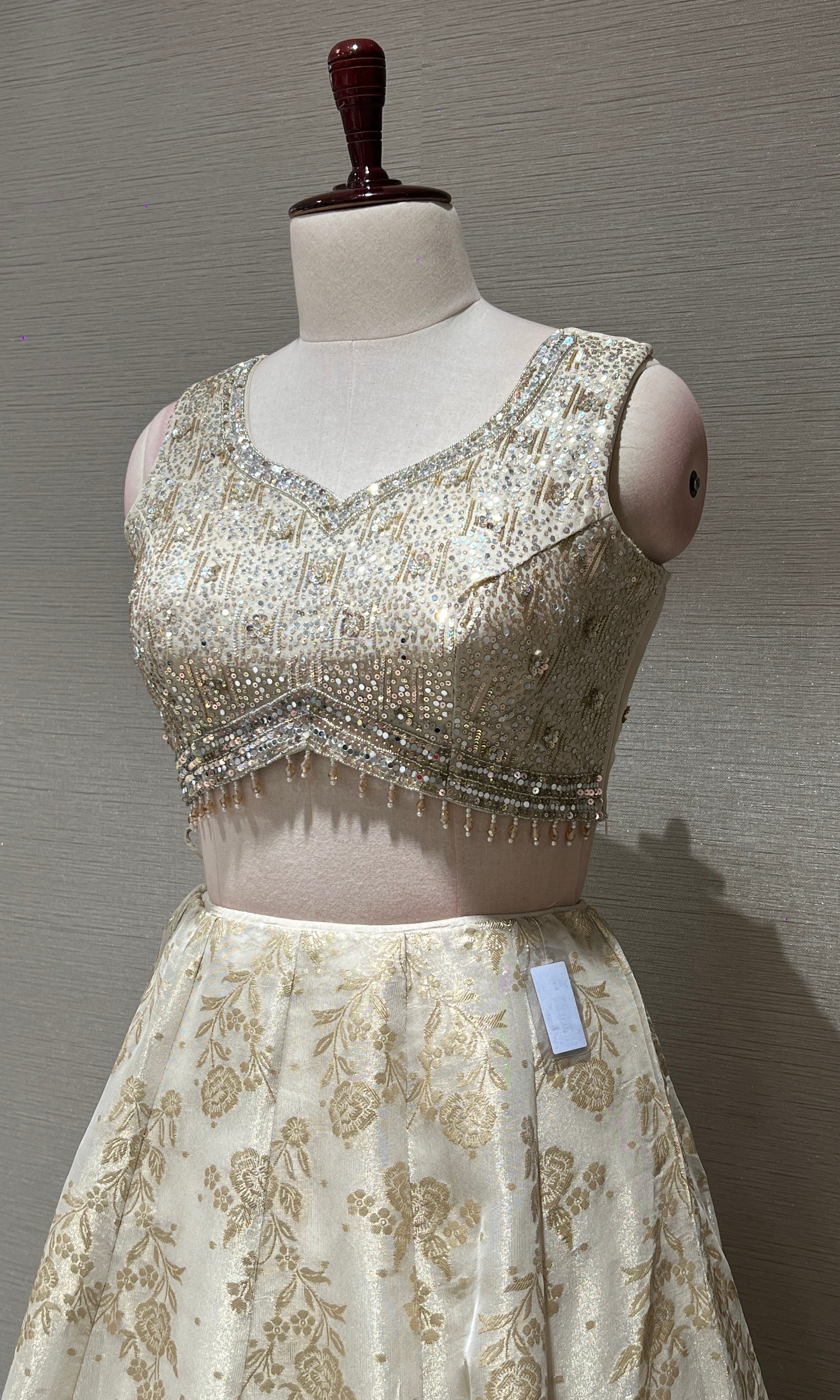 Off white Gold Lehenga with Embellished Blouse