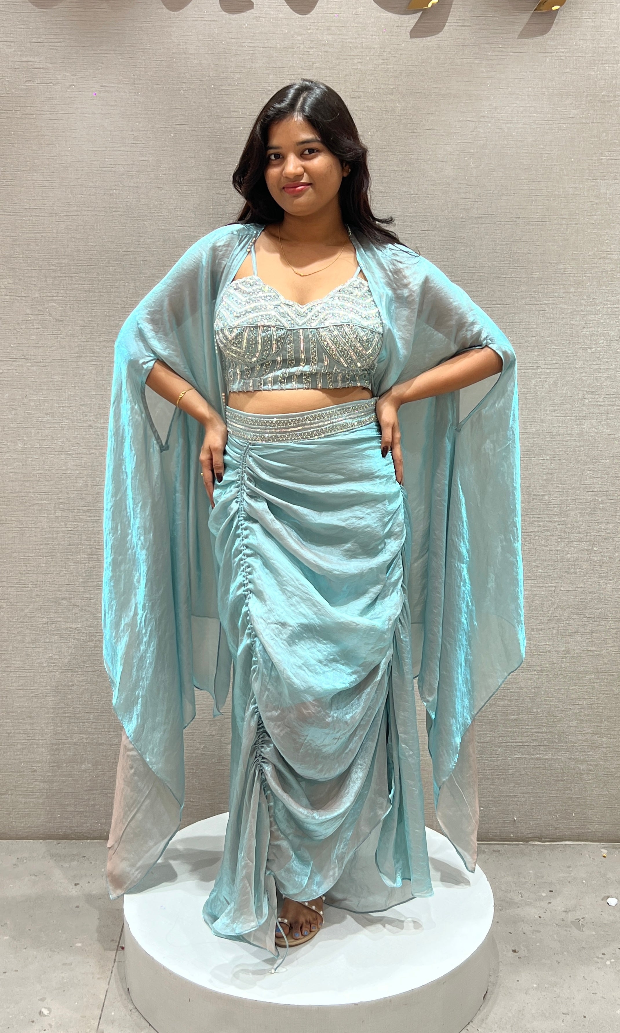 Aqua blue draped saree with Crystal Blouse