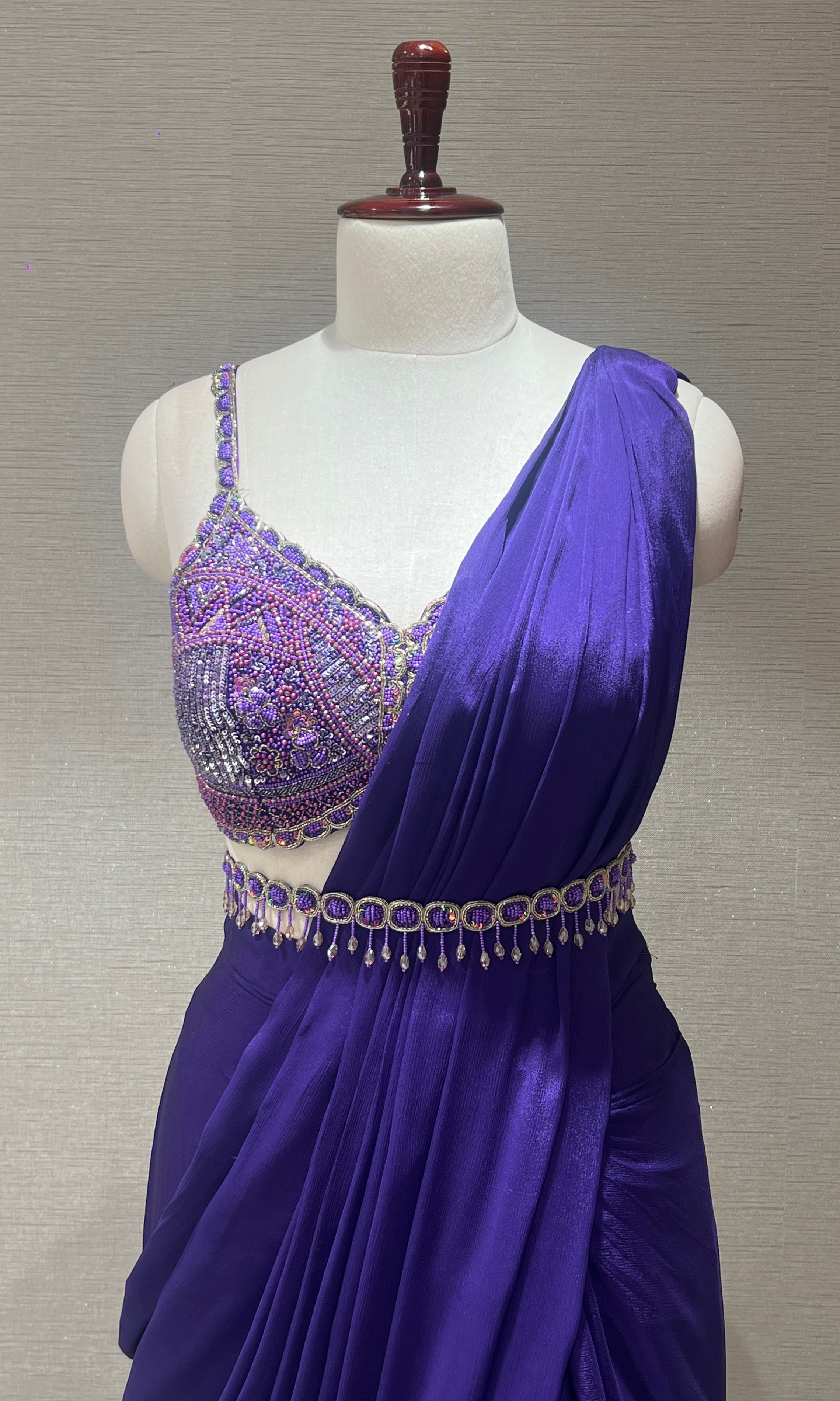 Purple drape saree with embroidered blouse