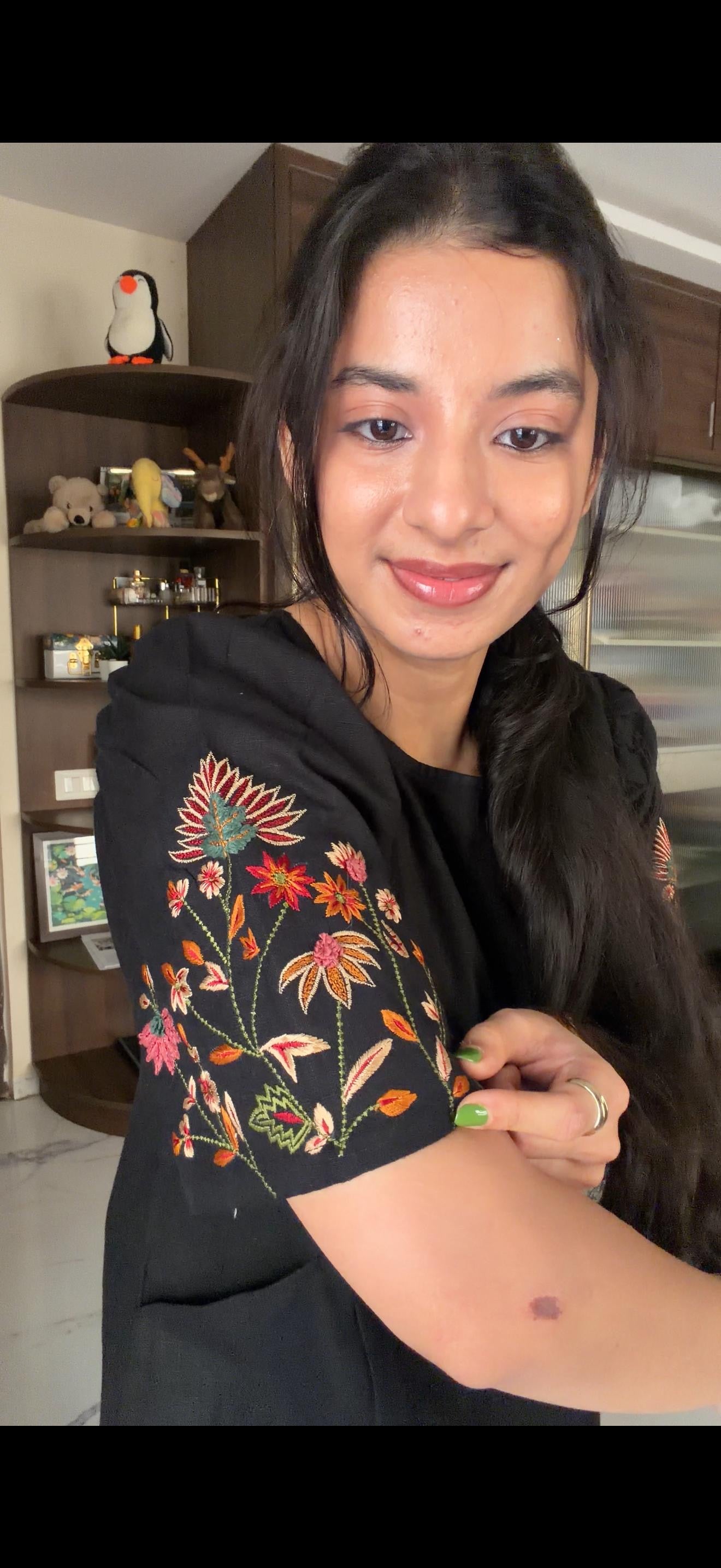 Black dress with embroidered puff sleeves