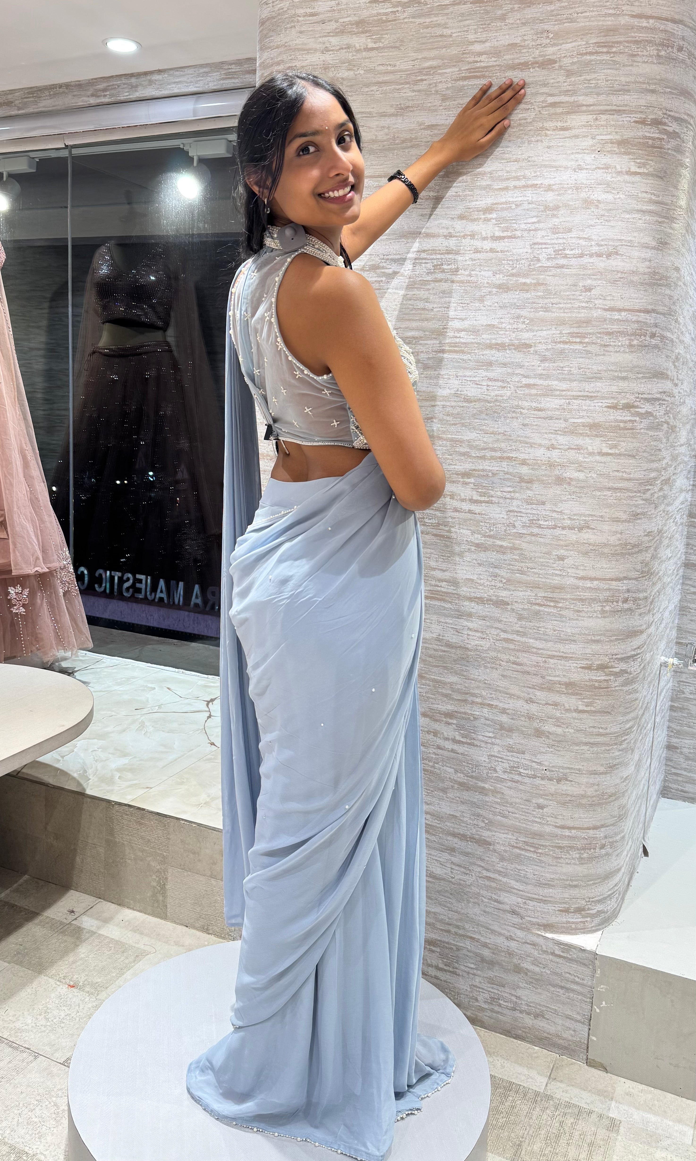 Blue Drape Saree with embellished haler neck