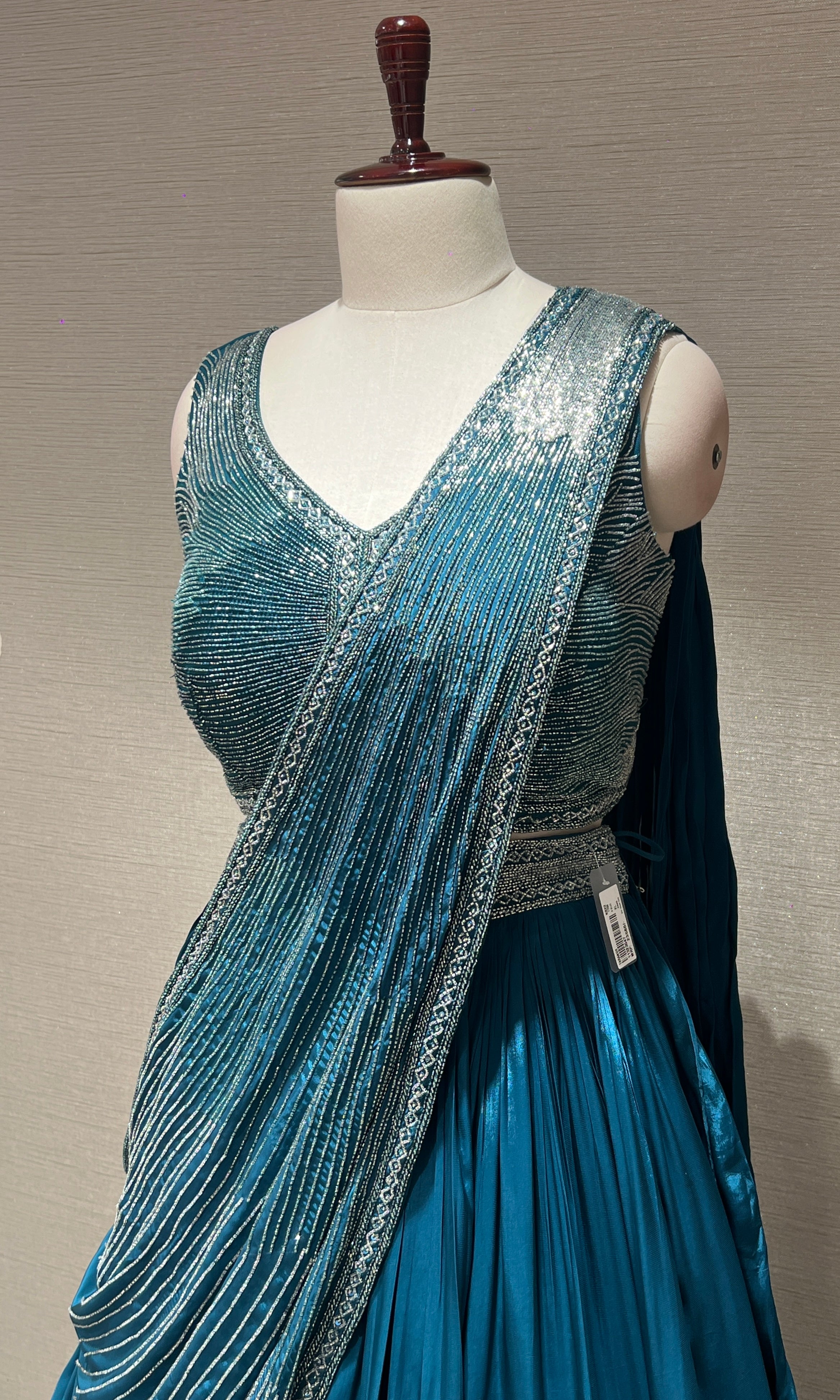 Peacock green Lehenga with draped sequins Pallu