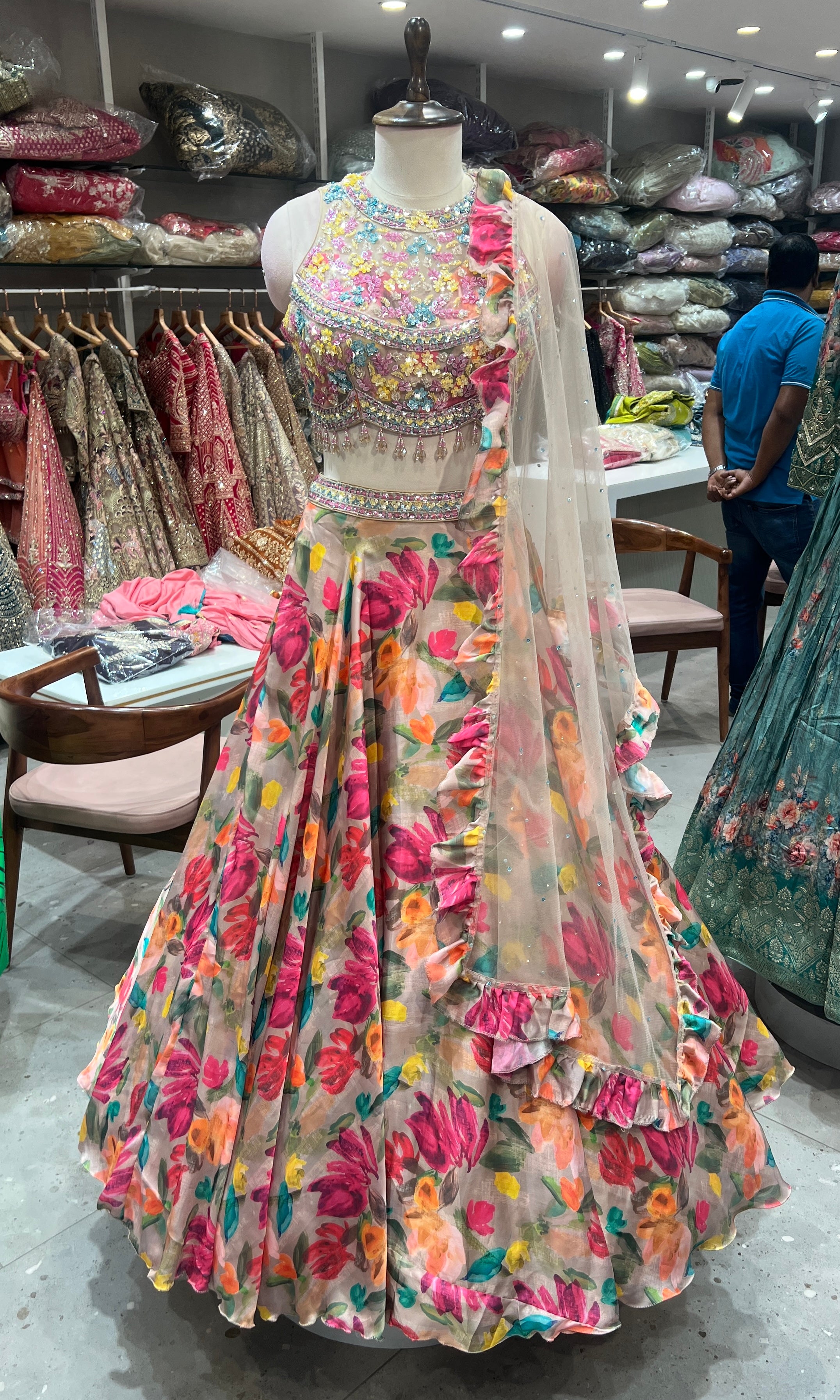 floral silk lehenga with intricate halter neck blouse