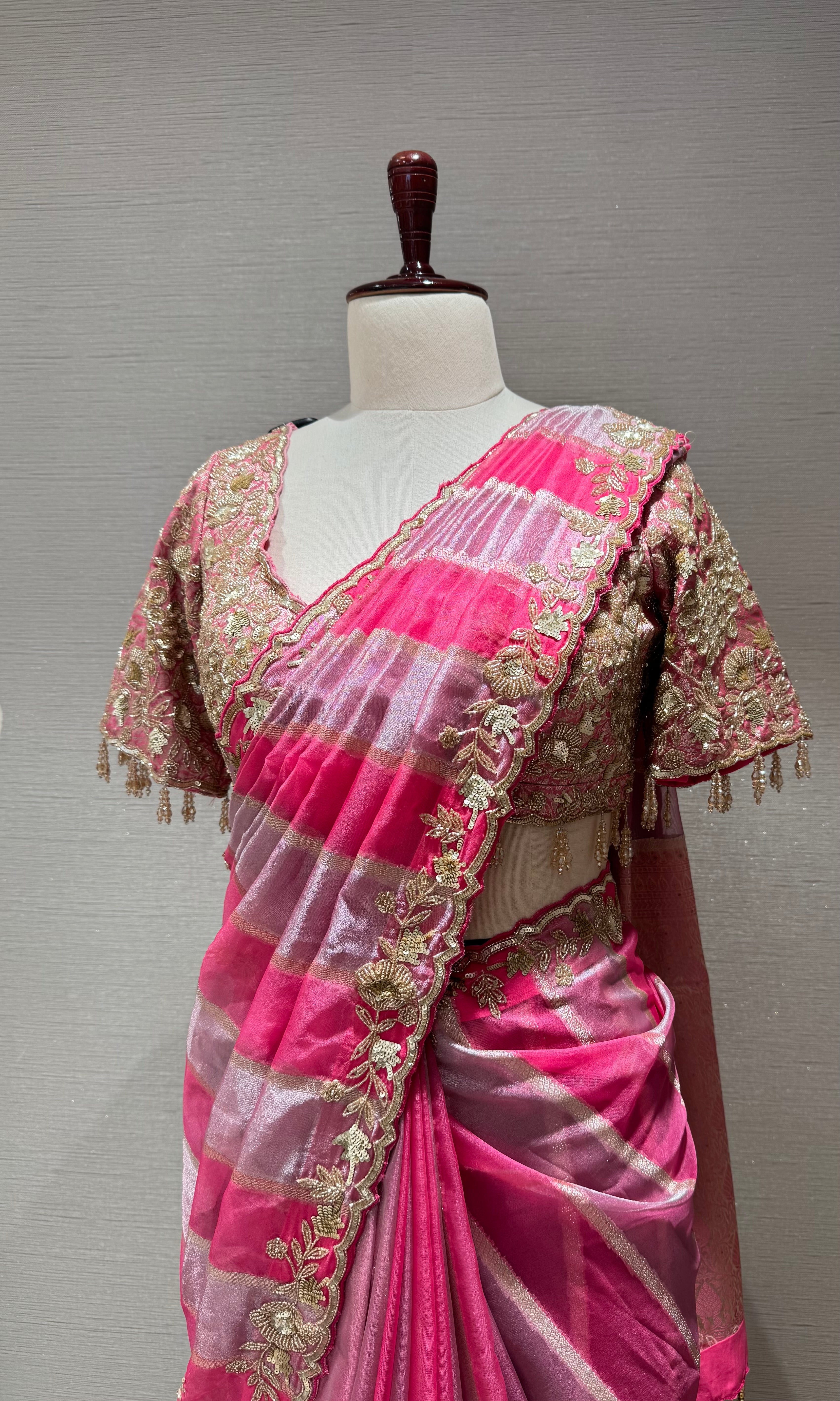 pink leheriya tissue saree with embellished blouse