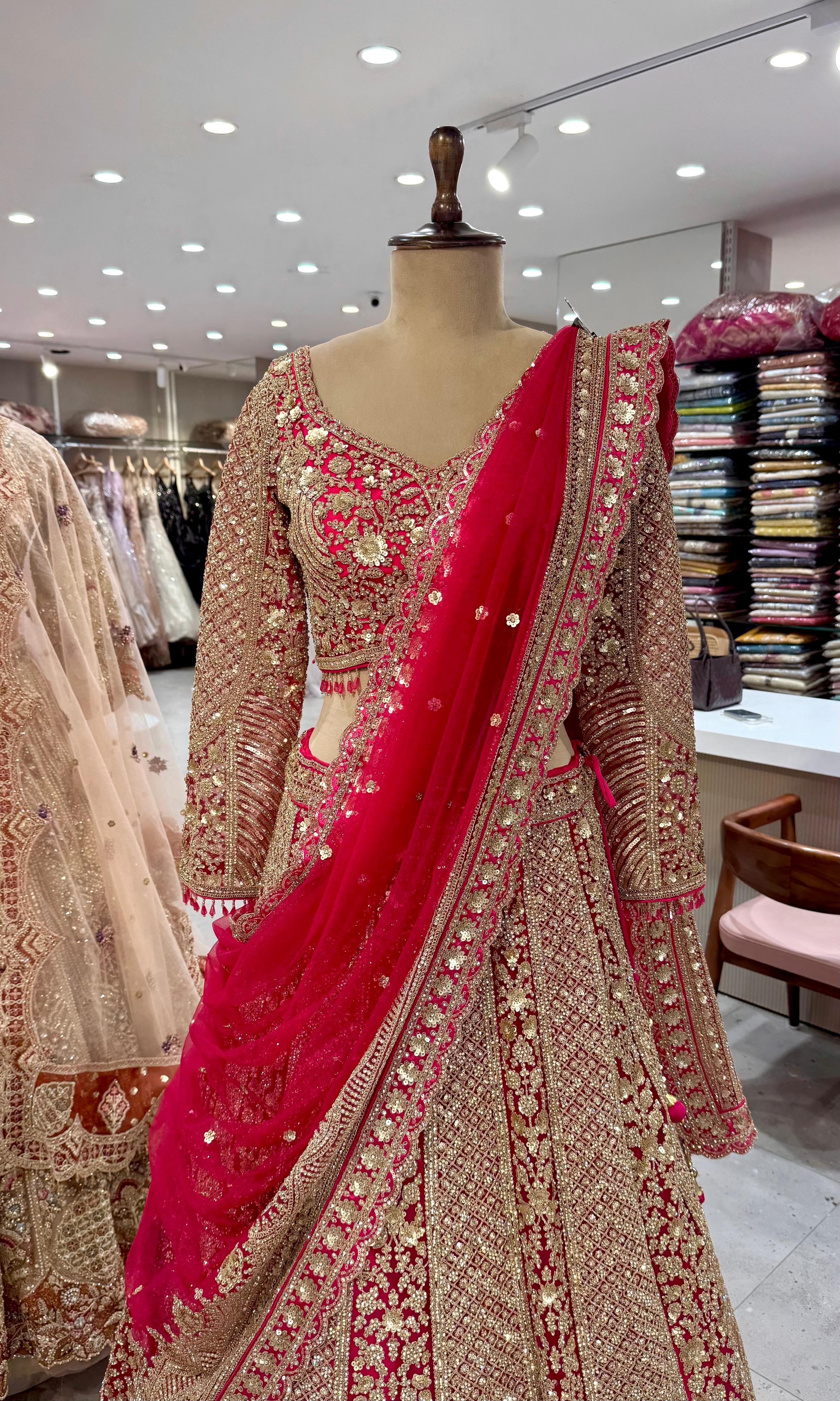 Pink Lehenga with Intricate Gold Detailing