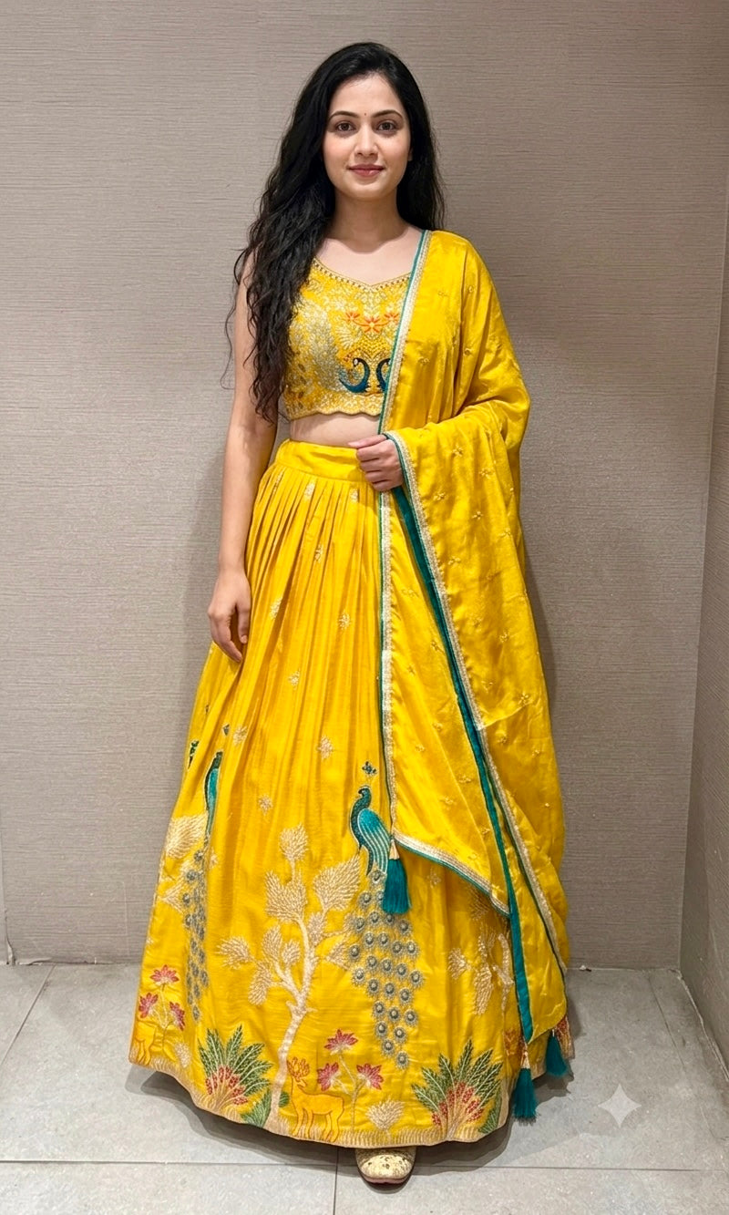 yellow lehenga with peacock design