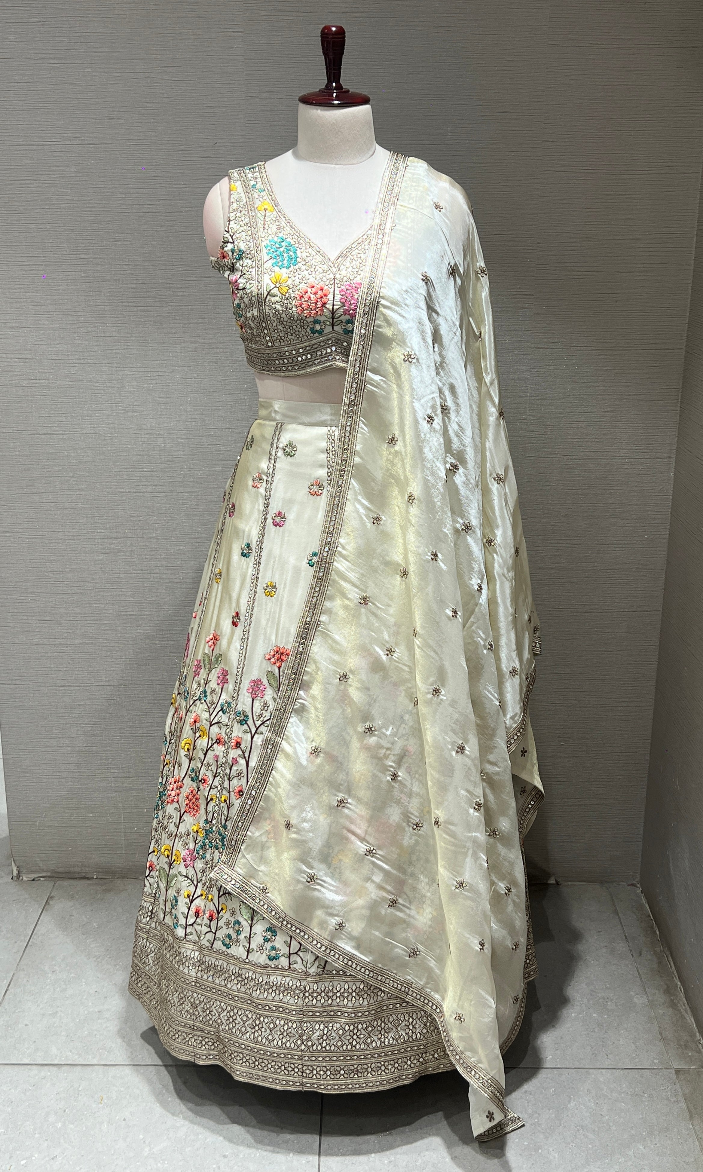 Half white floral embroidery Lehenga