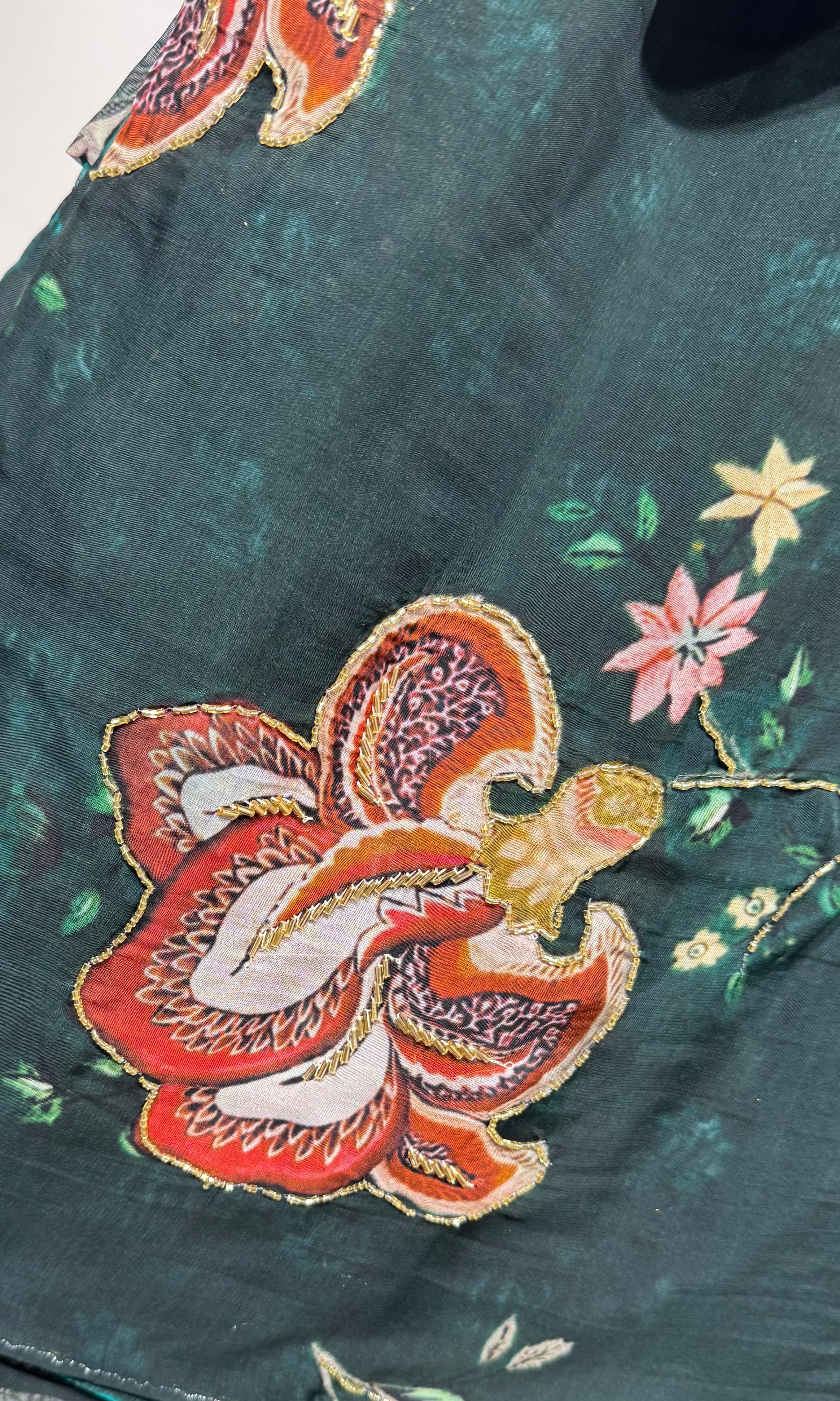 Green floral saree with embroidered blouse