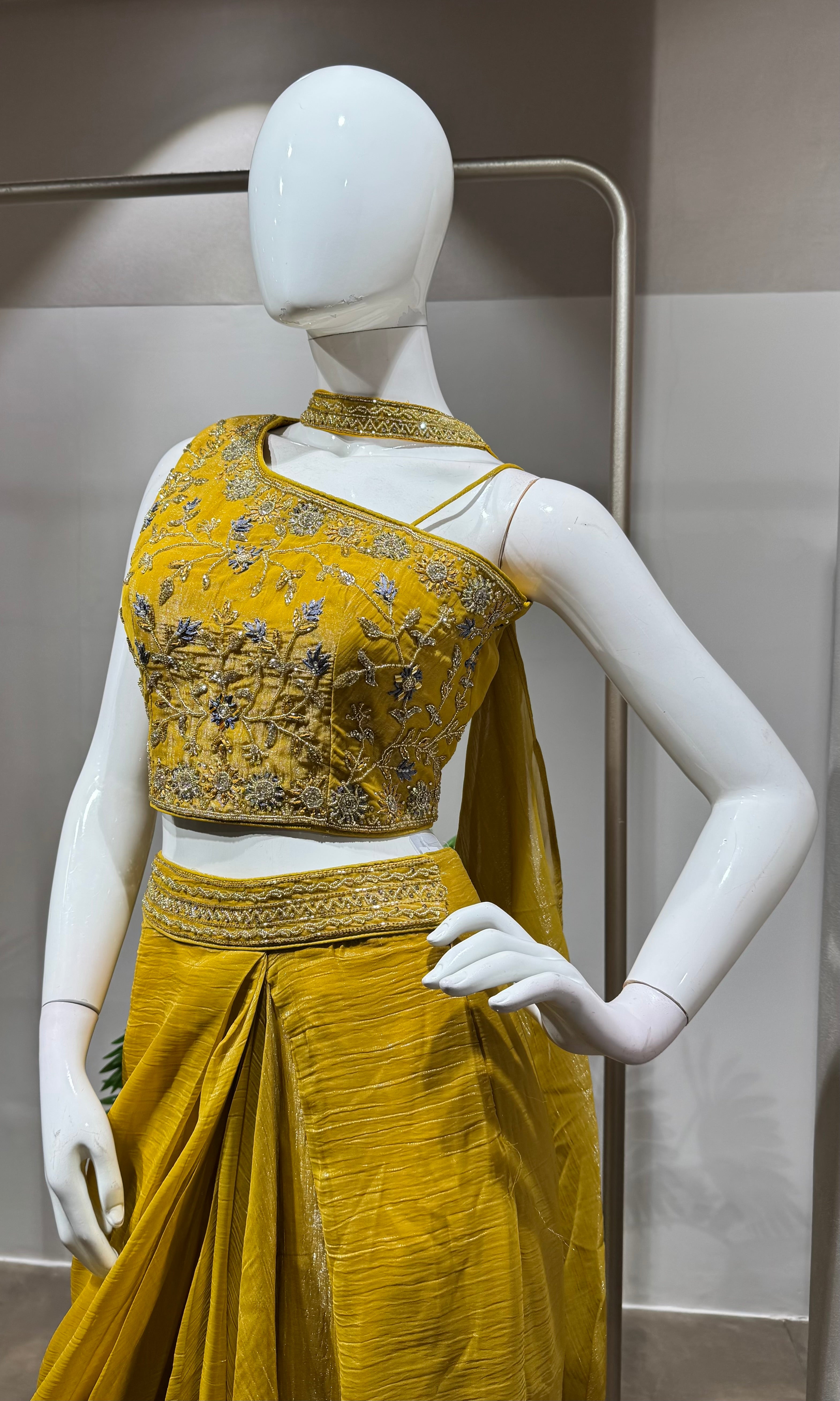 mustard draped skirt with embellished blouse
