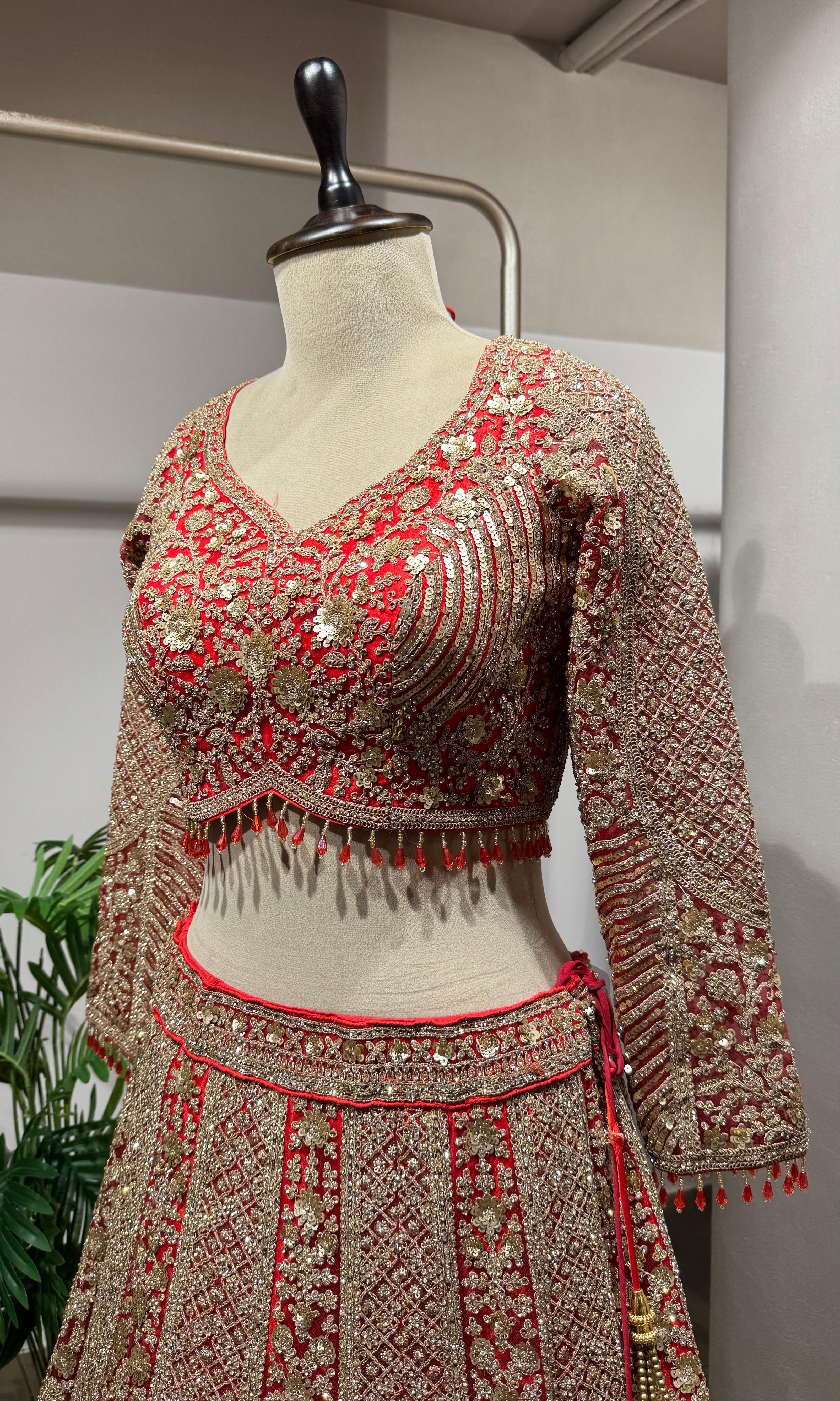 Red golden embroidery bridal lehenga