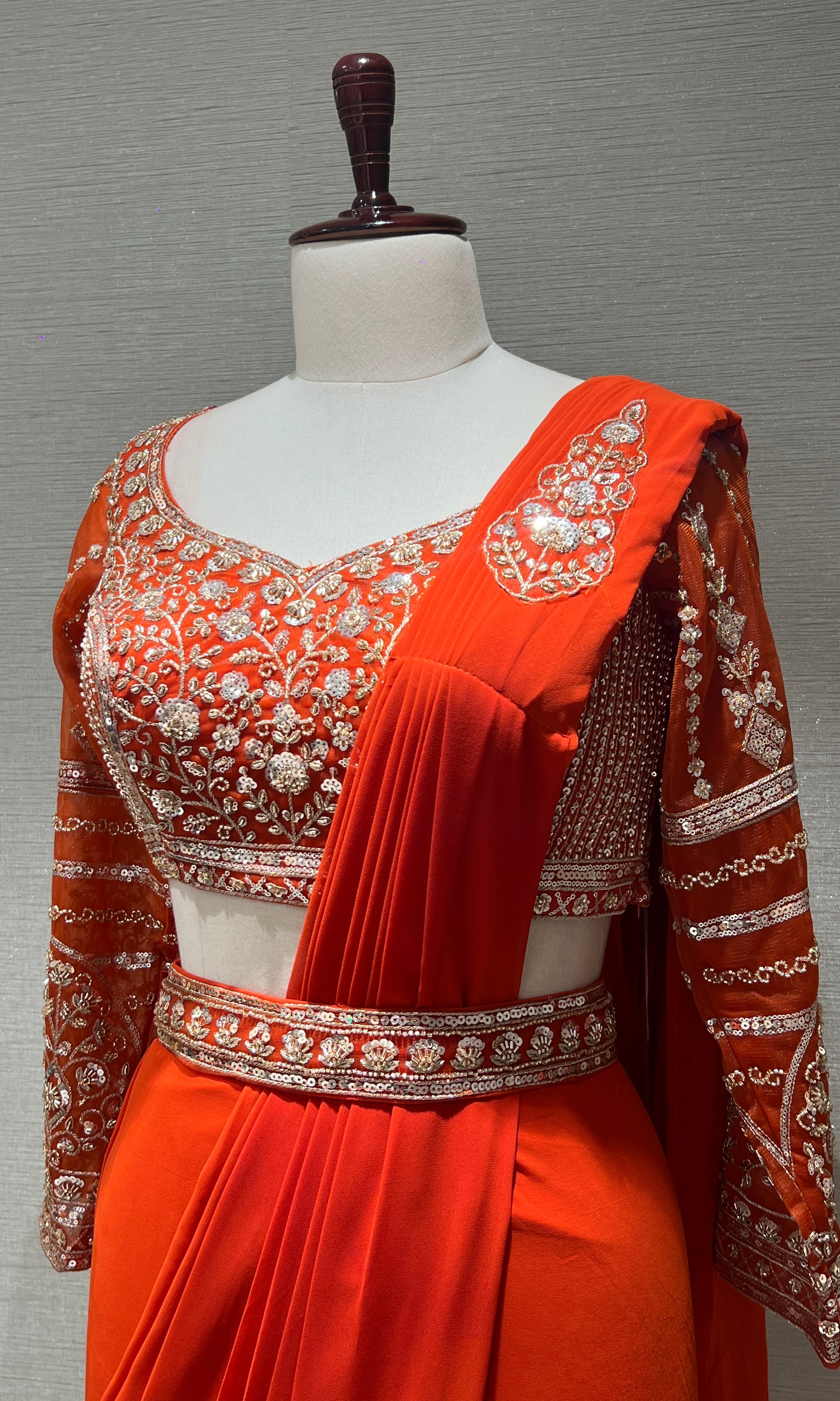 ORANGE drape saree with embellished blouse