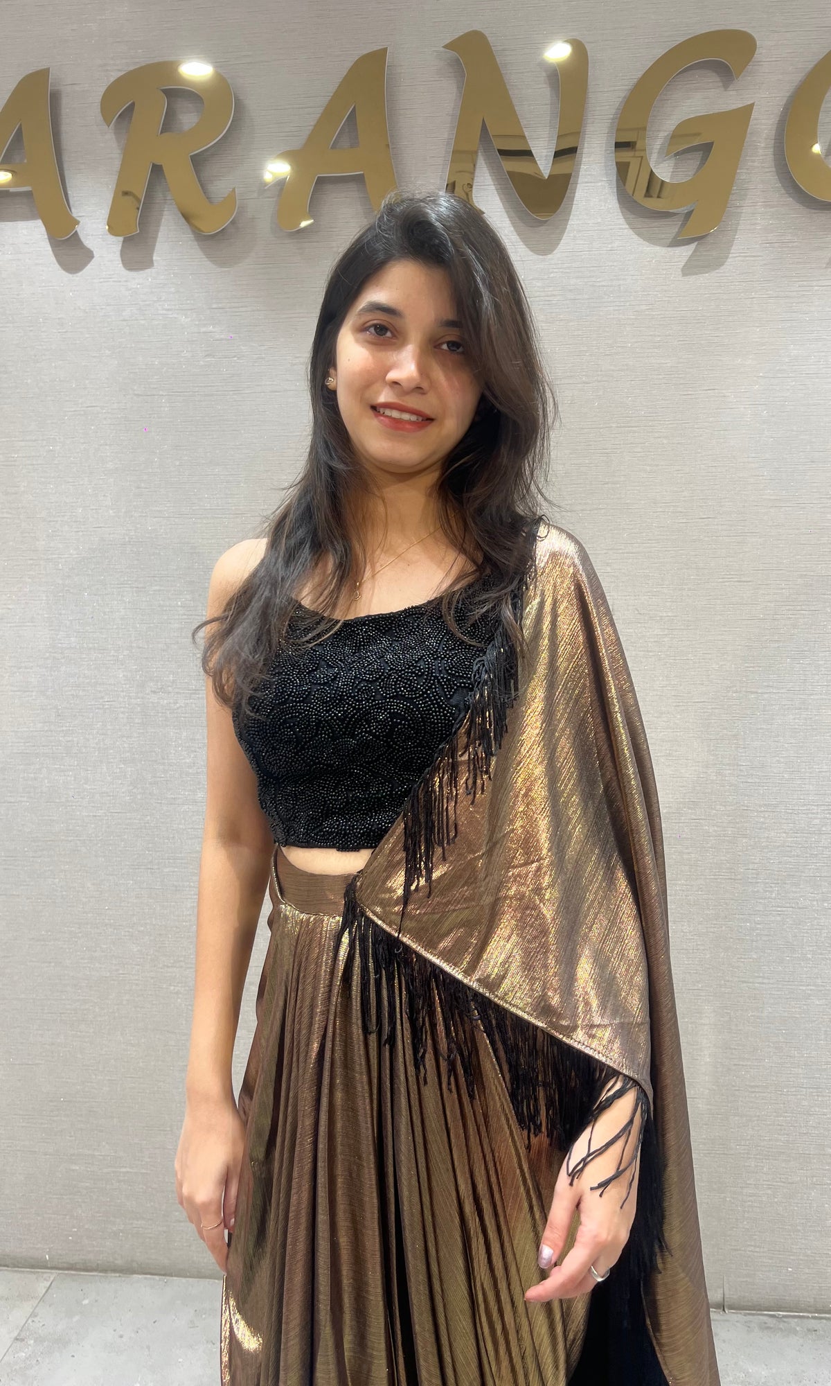 Metallic Brown Pleated Saree with Embroidered Black Blouse