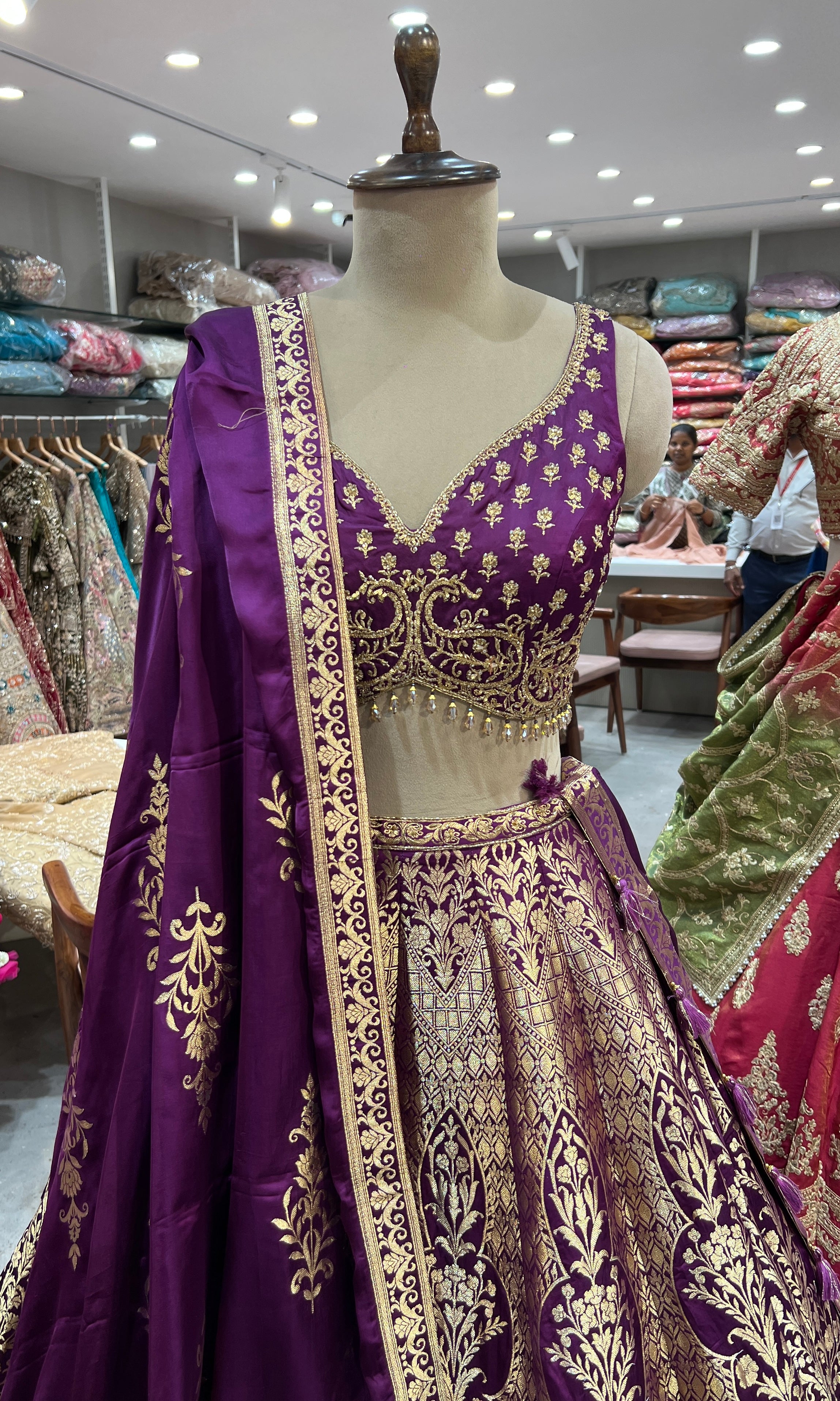 purple heavy gold embroidered lehenga